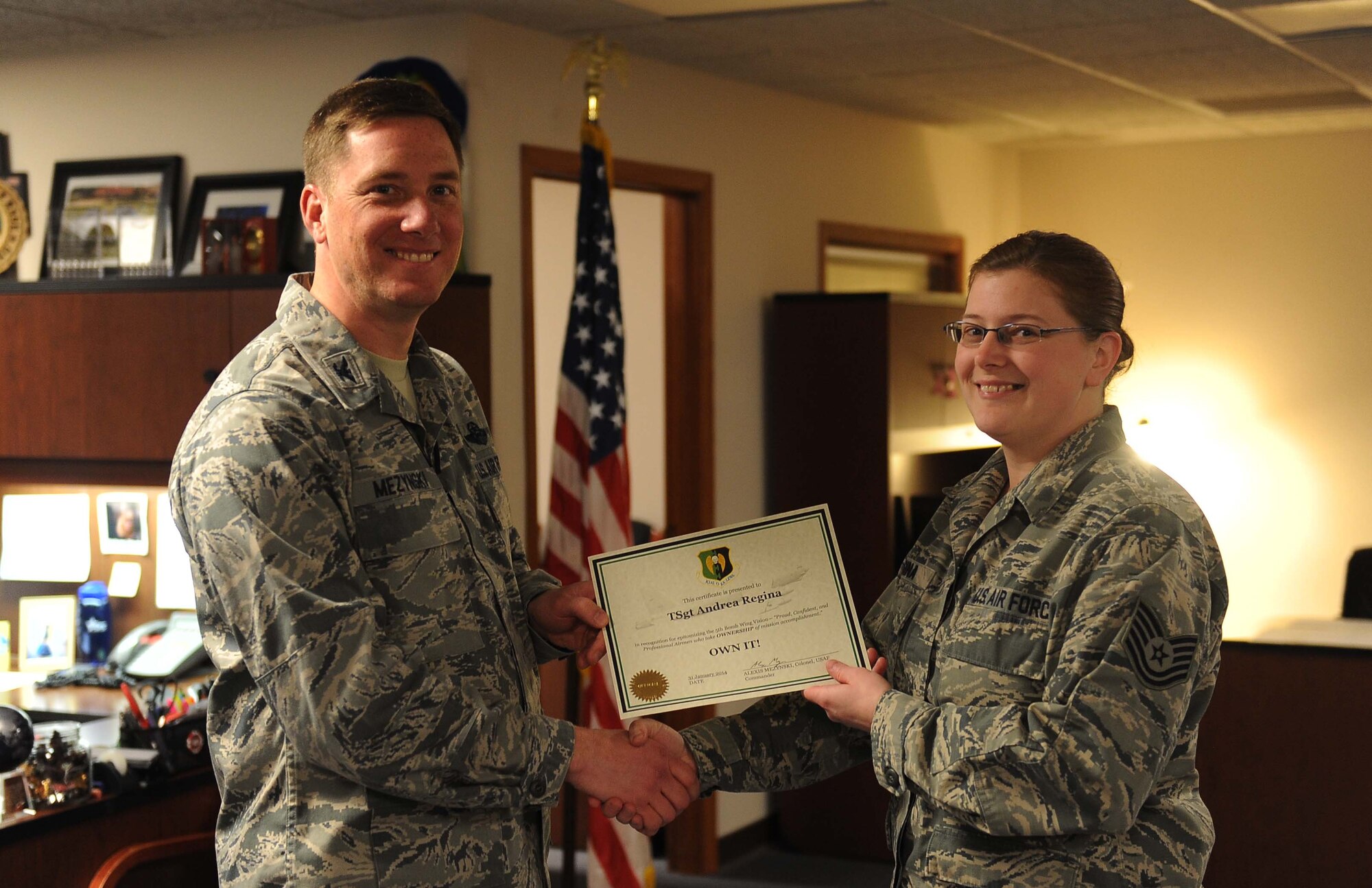 1st Lt. Luis Linares, 5th Force Support Squadron & Tech. Sgt. Andrea Regina, 5th Mission Support Group, have epitomized the 5 BW/CC’s vision of mission ownership.  They quickly and efficiently distributed Force Management eligibility rosters to wing leadership, affecting 2,804 Team Minot members across 36 units within 24-hours.  Furthermore, these professionals hosted 23 town hall meetings within 5 days to educate military and civilian personnel, including spouses, on the FY14 Force Management Programs, making Minot the first base in the command to launch this initiative.  During this period, 1,058 personnel were informed and armed with tools to make time-sensitive career decisions.  Additionally, by leveraging technology, the Q&A information gathered from the town hall briefings was posted on the 5 FSS Minot MPS SharePoint page via Air Force Portal, accessible to all Team Minot personnel, at home station and deployed.  The feedback and questions gathered from the town halls were then forwarded and answered by AFPC and later utilized to update Force Management program guidance Air Force-wide.  Lt. Linares and Tech. Sgt. Regina have undoubtedly simplified a difficult and complex program for Airmen across the wing, solidifying the 5th Bomb Wing’s vision of mission ownership. (U.S. Air Force photos/ Airman 1st Class Lauren Pitts)