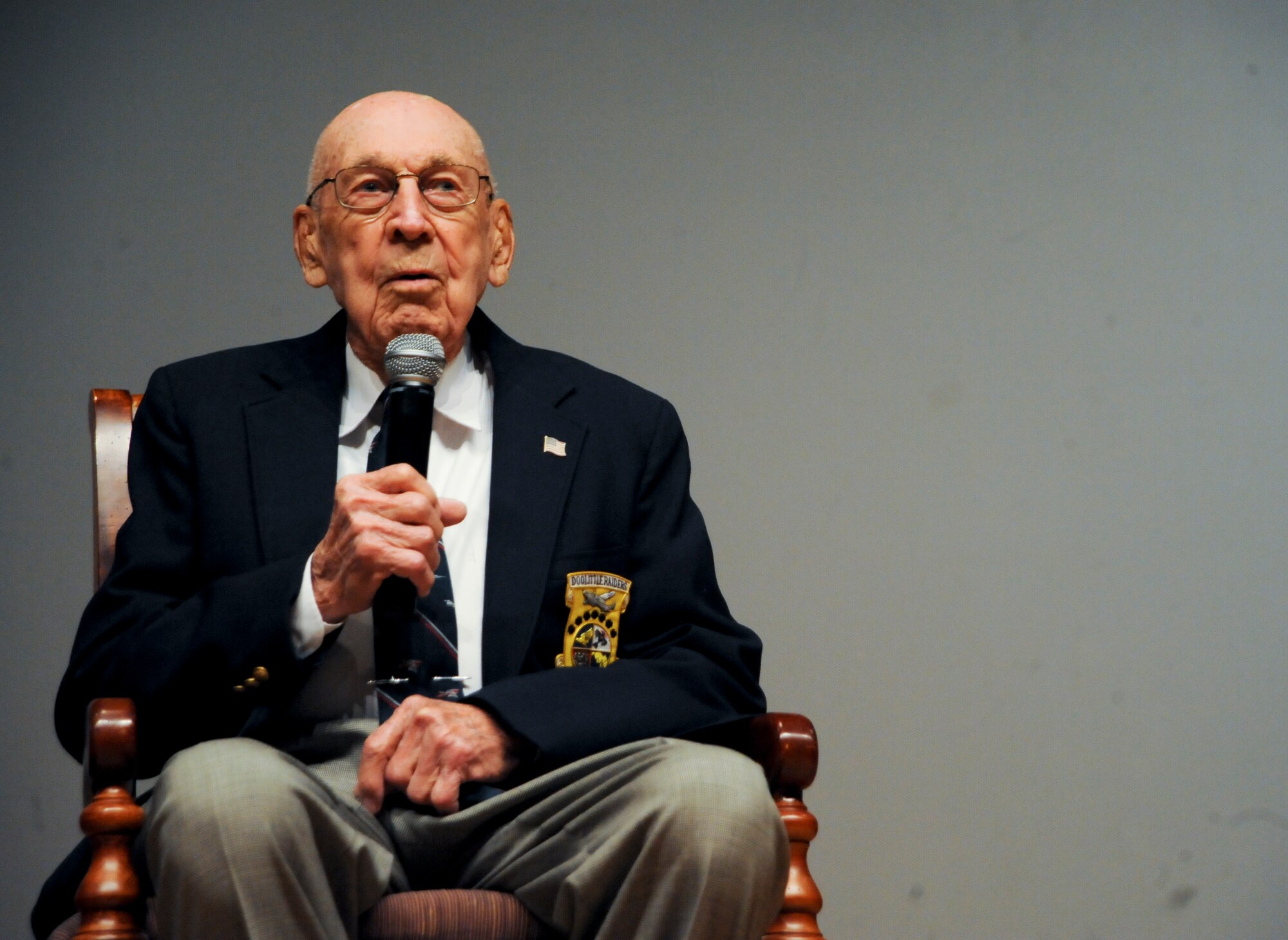 Retired U. S. Air Force Lt. Col. Richard “Dick” Cole, a Doolittle Raider, answers questions at the base theater regarding the Doolittle Raid during a question and answer event at Davis-Monthan Air Force Base, Ariz., Feb. 24, 2014. At the event Cole described details of the raid, explained his emotions and how he personally survived. (U.S. Air Force photo by Senior Airman Sivan Veazie/Released)
