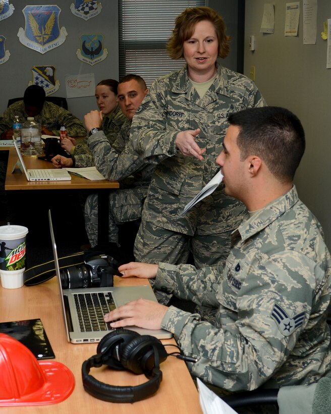 U.S. Air Force Staff Sgt. Aimee Orndorff, 633rd Force Support Squadron ALS instructor, speaks to students at Langley Air Force Base, Va., Feb. 11, 2014. Airman Leadership School is a five-week long course designed to develop Airmen into effective front-line supervisors. (U.S. Air Force photo by Airman 1st Class Victoria H. Taylor/Released)