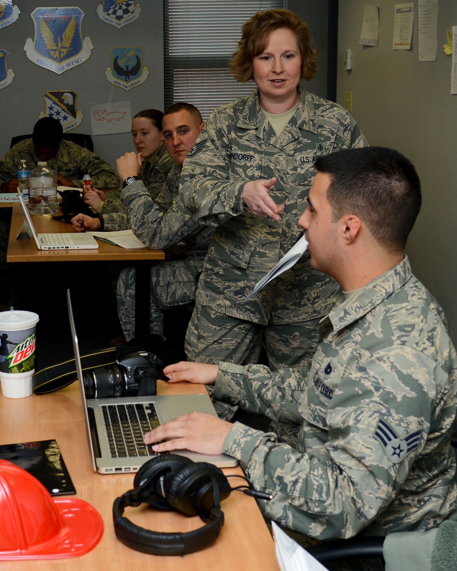 U.S. Air Force Staff Sgt. Aimee Orndorff, 633rd Force Support Squadron ALS instructor, speaks to students at Langley Air Force Base, Va., Feb. 11, 2014. Airman Leadership School is a five-week long course designed to develop Airmen into effective front-line supervisors. (U.S. Air Force photo by Airman 1st Class Victoria H. Taylor/Released)