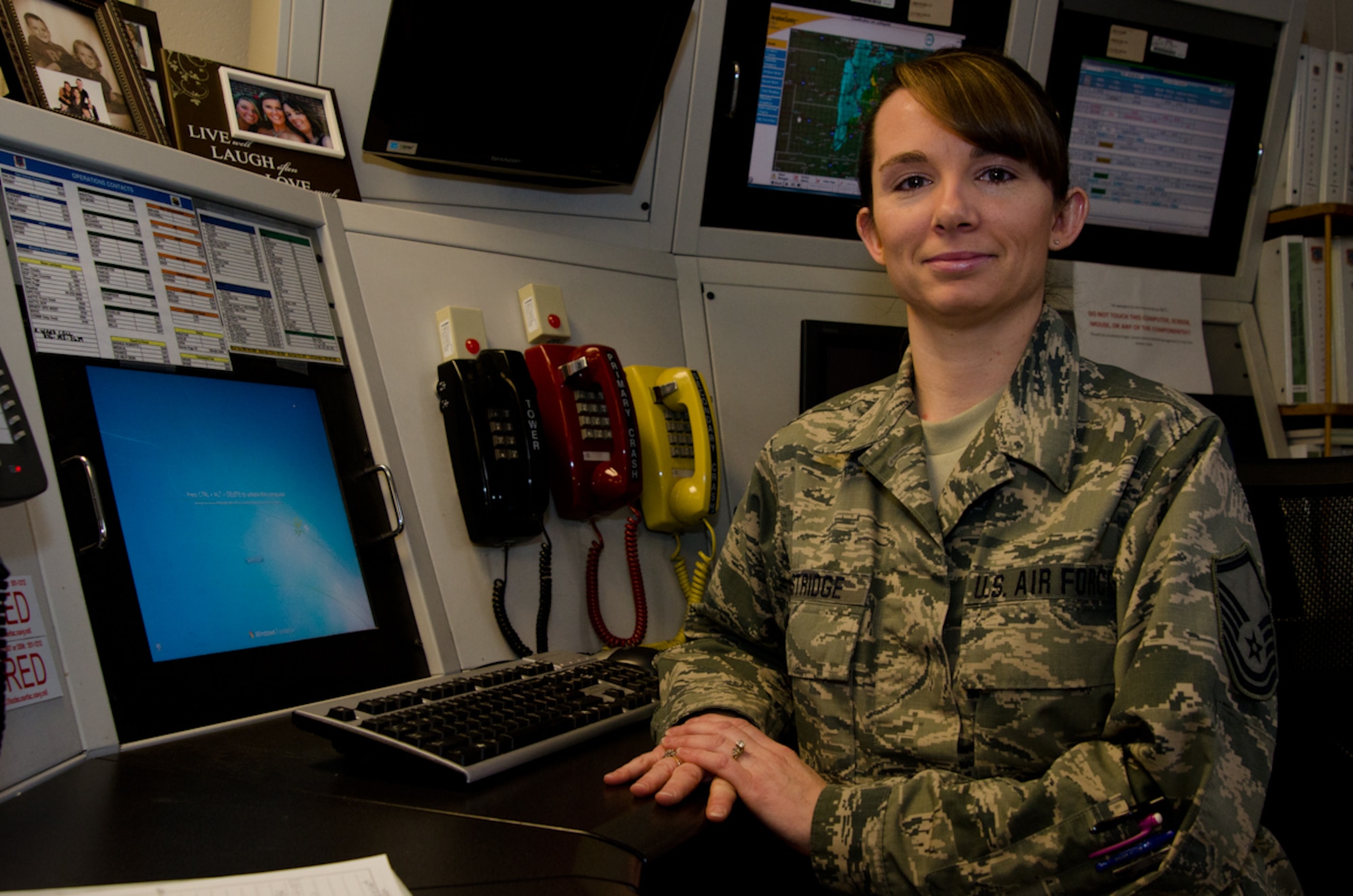 U.S. Air Force Master Sgt. Bernadine Eastridge, 139th Airfield Management Training non-commissioned officer in-charge, Missouri Air National Guard, poses at the airfield operations desk at Rosecrans Air National Guard Base, Mo., Feb. 20, 2014.  Eastridge was selected to receive the Airfield Management Craftsman of the Year award.  (U.S. Air National Guard photo by: Senior Airman Patrick P. Evenson/Released)
