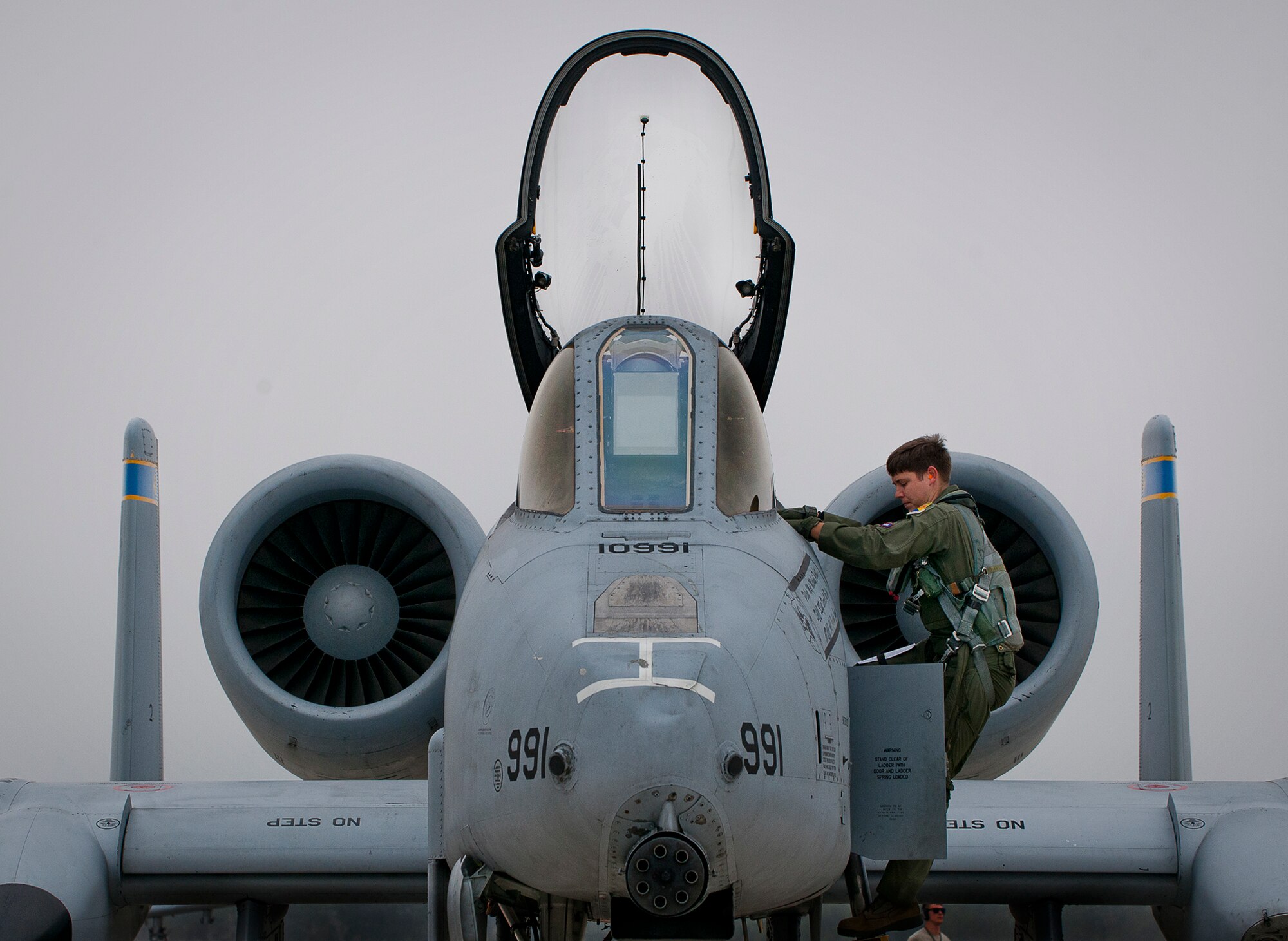 A 355th Fighter Wing pilot climbs into his A-10 Thunderbolt II for a morning Weapon System Evaluation Program sortie at Eglin Air Force Base, Fla., Feb. 19.  The A-10s from Davis-Monthan Air Force Base, Ariz., participated in the week-long mission known as Combat Hammer, in which they released air-to-ground munitions.  The Combat Hammer WSEP program is managed by the 86th Fighter Weapons Squadron, part of the 53rd Wing.  (U.S. Air Force photo/Samuel King Jr.)
