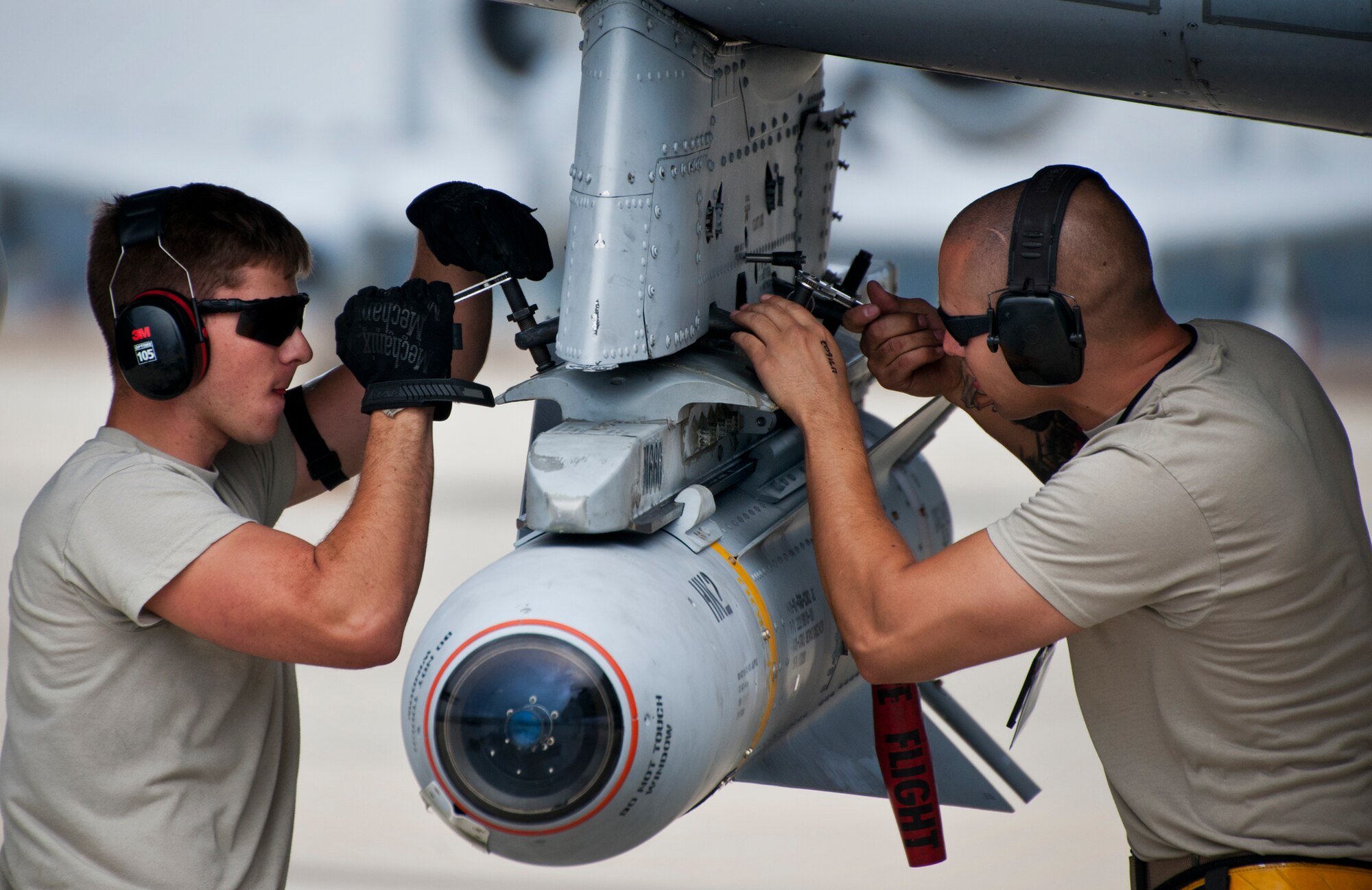 Maintainers from the 355th Aircraft Maintenance Squadron, secure an AGM-65 to an A-10 Thunderbolt II prior to a morning Weapon System Evaluation Program sortie at Eglin Air Force Base, Fla., Feb. 19.  The A-10s from Davis-Monthan Air Force Base, Ariz., participated in the week-long mission known as Combat Hammer, in which they released air-to-ground munitions.  The Combat Hammer WSEP program is managed by the 86th Fighter Weapons Squadron, part of the 53rd Wing.  (U.S. Air Force photo/Samuel King Jr.)