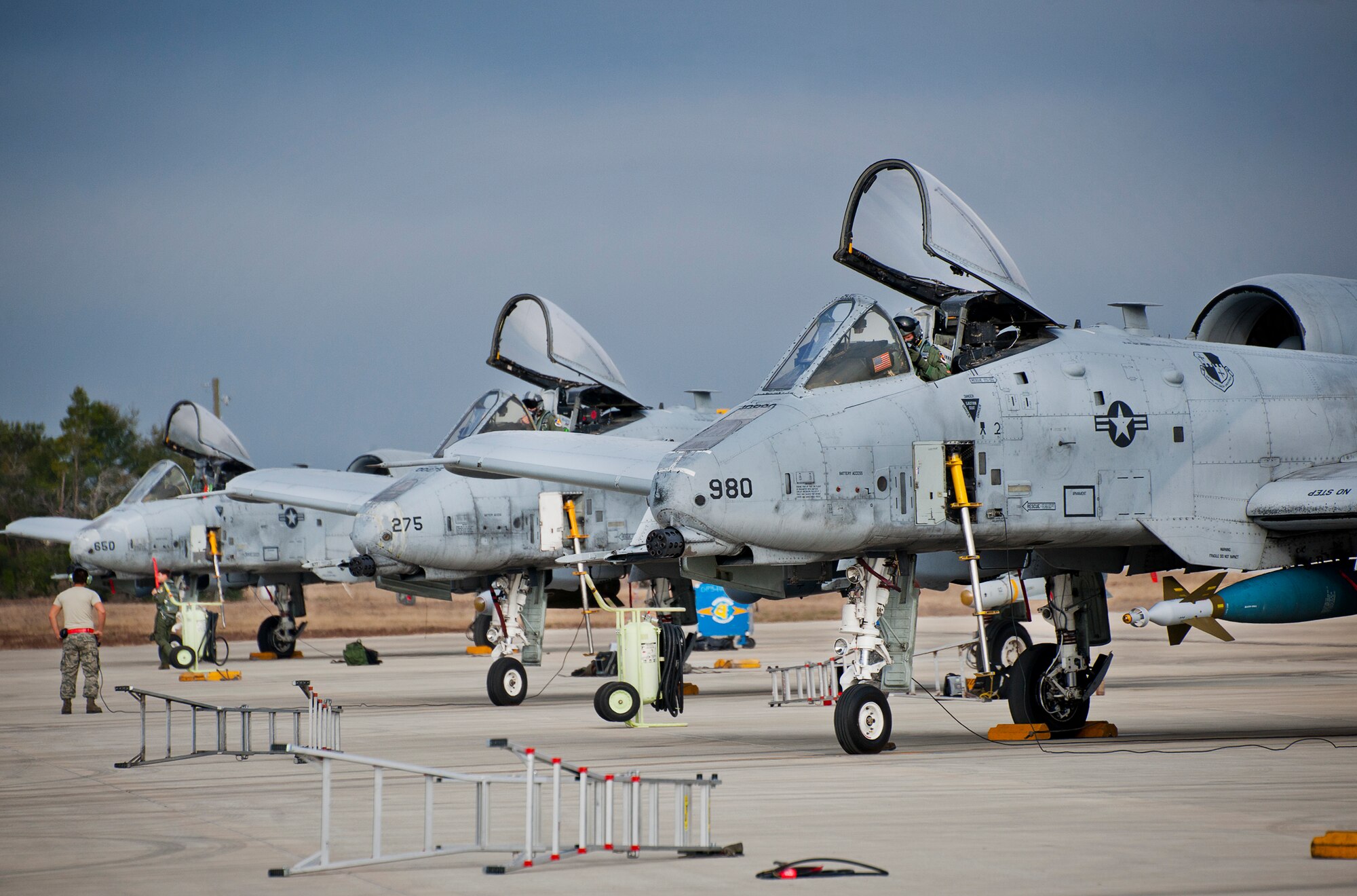 A-10 Thunderbolt IIs from the 355th Fighter Wing are prepared for a morning Weapon System Evaluation Program sortie at Eglin Air Force Base, Fla., Feb. 19.  The A-10s from Davis-Monthan Air Force Base, Ariz., participated in the week-long mission known as Combat Hammer, in which they released air-to-ground munitions.  The Combat Hammer WSEP program is managed by the 86th Fighter Weapons Squadron, part of the 53rd Wing.  (U.S. Air Force photo/Samuel King Jr.)