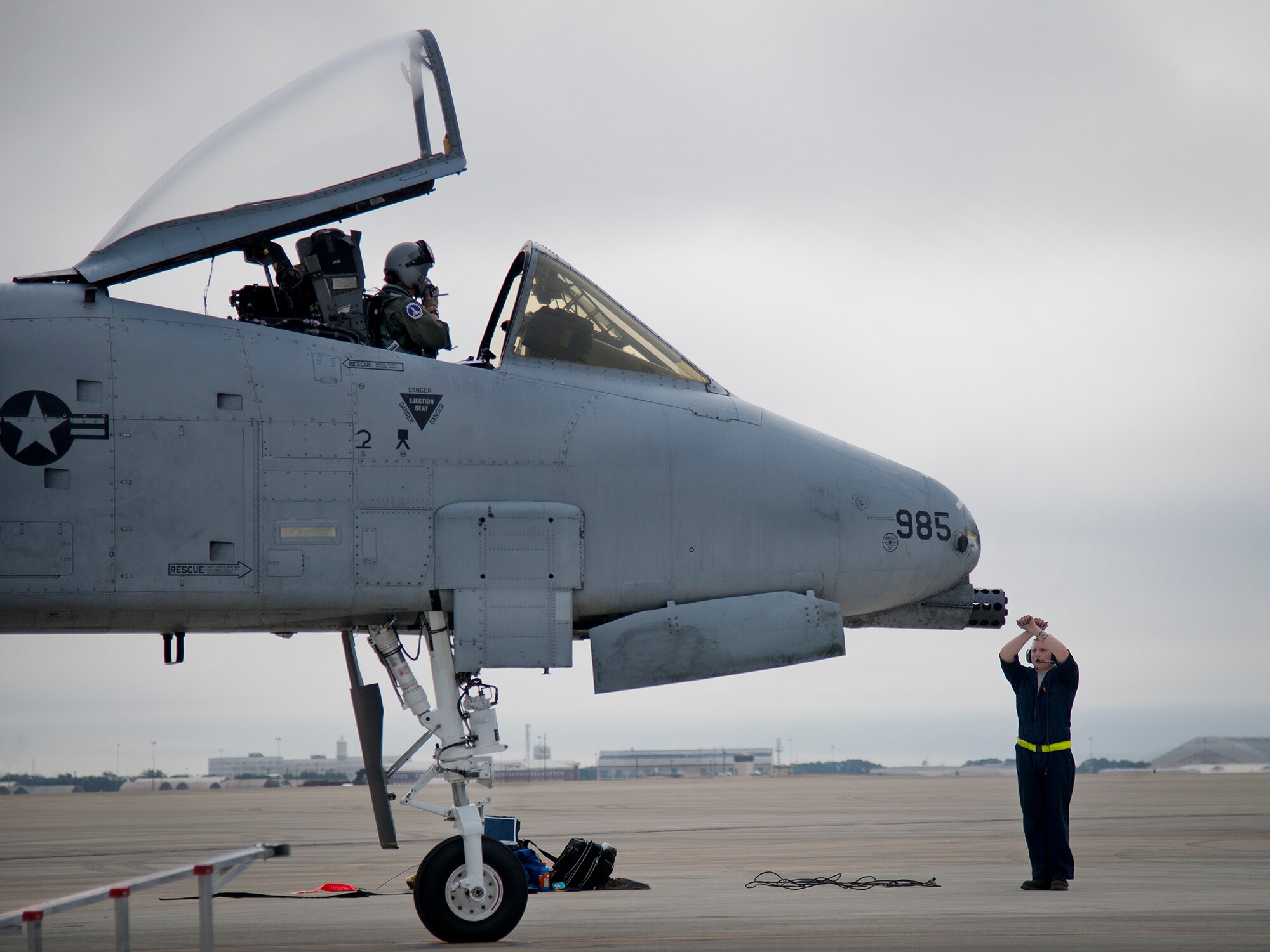Airman 1st Class Paul Hoogewind, of the 355th Aircraft Maintenance Squadron, prepares to marshal out his A-10 for a Weapon System Evaluation Program sortie at Eglin Air Force Base, Fla., Feb. 19.  The A-10s from Davis-Monthan Air Force Base, Ariz., participated in the week-long mission known as Combat Hammer, in which they released air-to-ground munitions.  The Combat Hammer WSEP program is managed by the 86th Fighter Weapons Squadron, part of the 53rd Wing.  (U.S. Air Force photo/Samuel King Jr.)