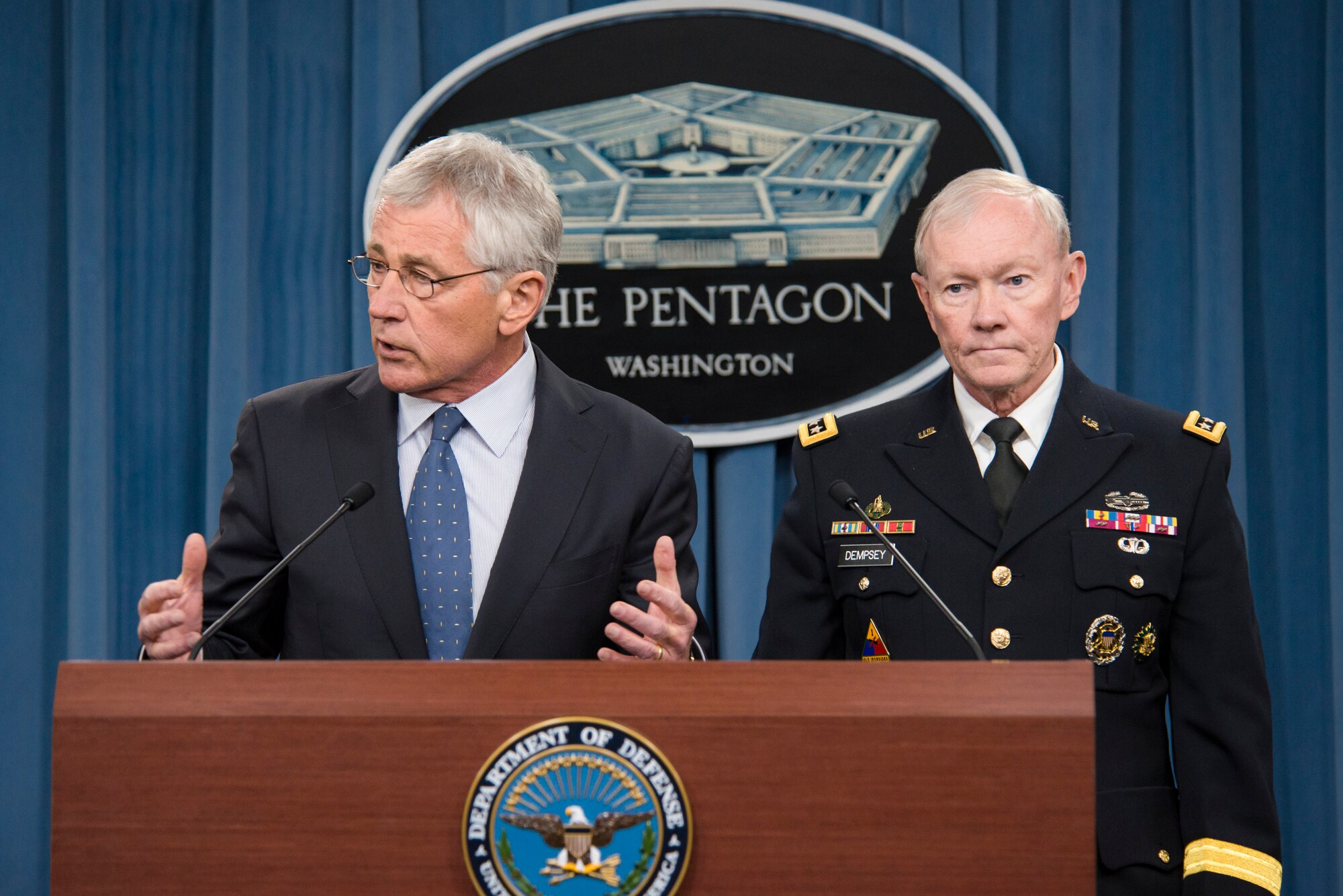 Defense Secretary Chuck Hagel and Army Gen. Martin E. Dempsey, chairman of the Joint Chiefs of Staff, brief reporters on the fiscal year 2015 defense budget proposal at the Pentagon, Feb. 24, 2014. (DOD photo by U.S. Army Staff Sgt. Sean K. Harp) 