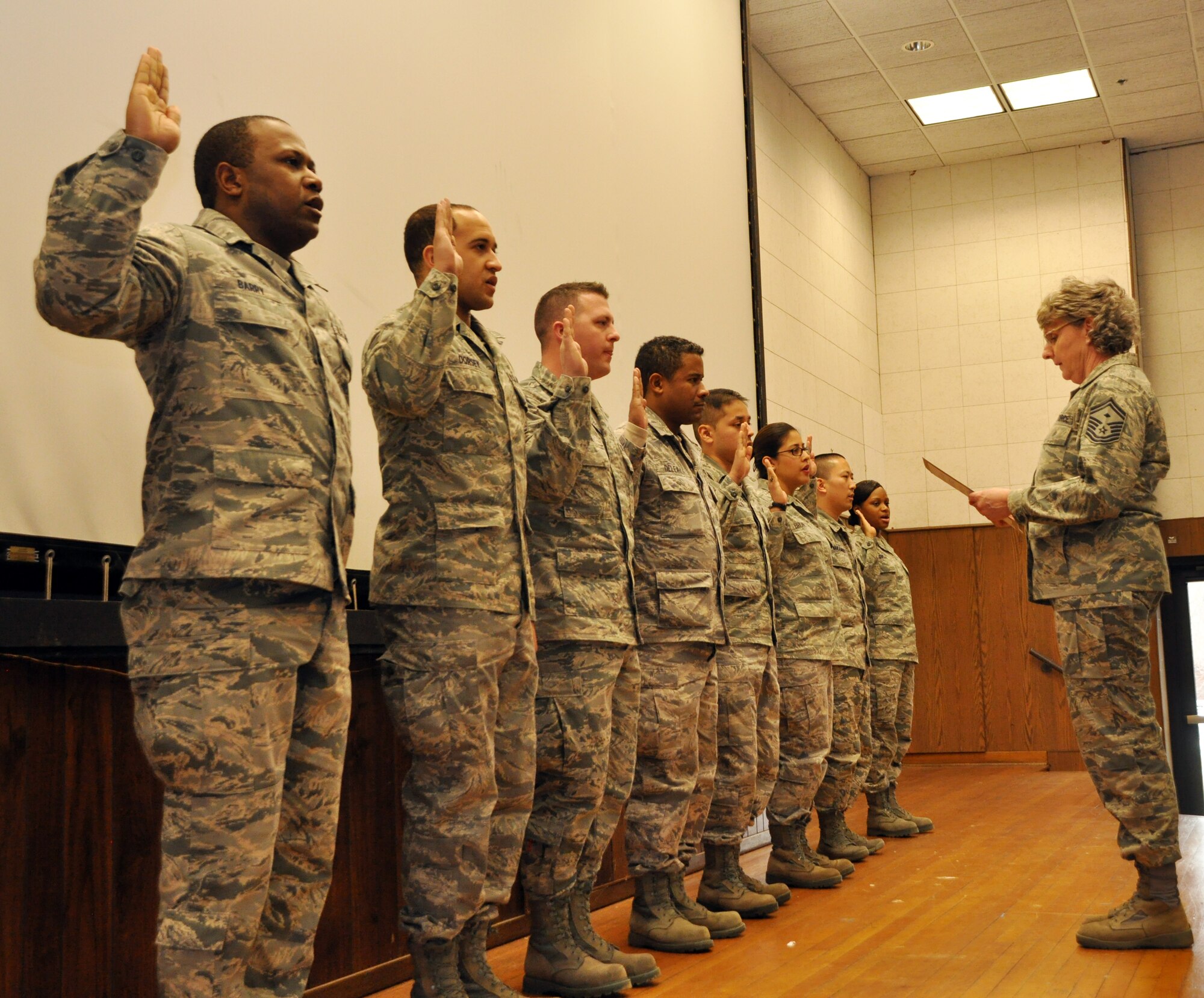 The 459th Air Refueling wing held an induction ceremony in the wing auditorium, Feb. 23, 2014, for Senior Non-Commissioned Officers and Non-Commissioned Officers. Leadership charged the inductees with their rights and responsibilities among an auditorium of their peers.  (U.S. Air Force photo by/ Staff Sgt. Amber J. Russell)