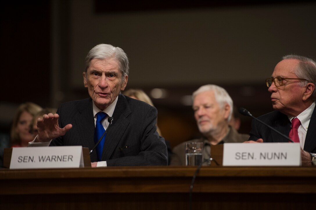 U.S. Sen. John Warner of Virginia comments on Robert O. Work during Work's nomination hearing for deputy defense secretary before the Senate Armed Services Committee in Washington, D.C., Feb. 25, 2014.