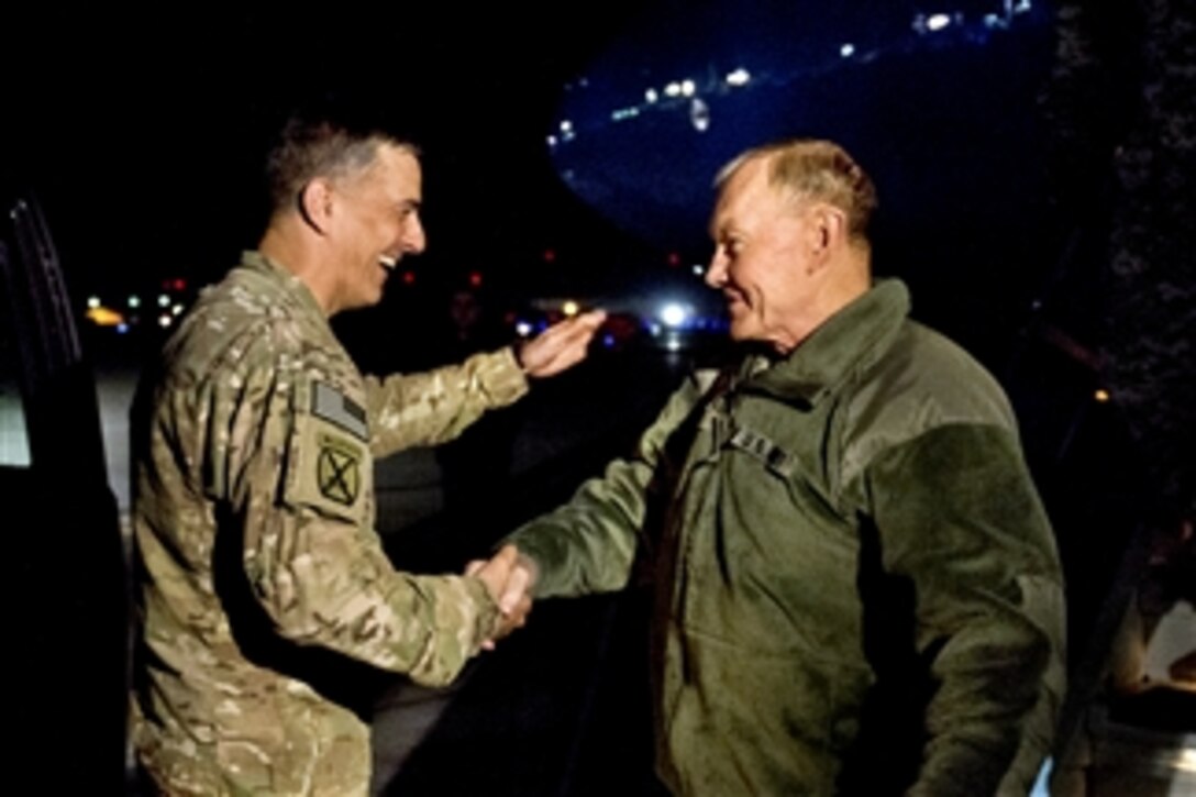 U.S. Army Gen. Martin E. Dempsey, chairman of the Joint Chiefs of Staff, shakes hands with U.S. Army Maj. Gen. Stephen J. Townsend, commander of the Combined Joint Task Force 10 and 10th Mountain Division, upon his arrival on Bagram Airfield, Afghanistan, Feb. 25, 2014. Dempsey is in Afghanistan to visit troops and commanders.