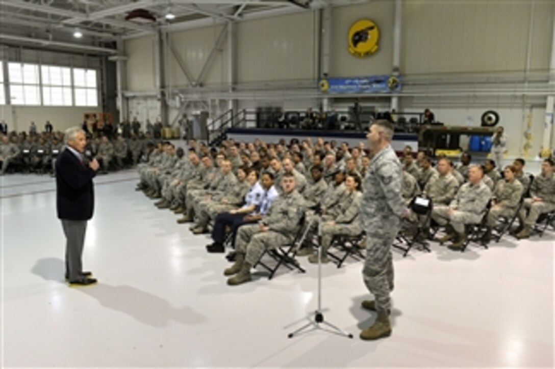 Defense Secretary Chuck Hagel takes a question after delivering remarks to several hundred airmen on Langley Air Force Base in Hampton, Va., Feb. 25, 2014. Hagel, who also visited nearby Fort Eustis, is on a three-day trip during which he will participate in NATO meetings for defense ministers in Brussels.