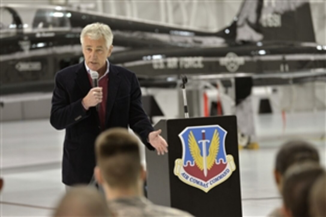 Defense Secretary Chuck Hagel delivers remarks to several hundred airmen on Langley Air Force Base in Hampton, Va., Feb. 25, 2014.  Hagel, who also visited nearby Fort Eustis, is on a three-day trip during which he will participate in NATO meetings for defense ministers in Brussels.