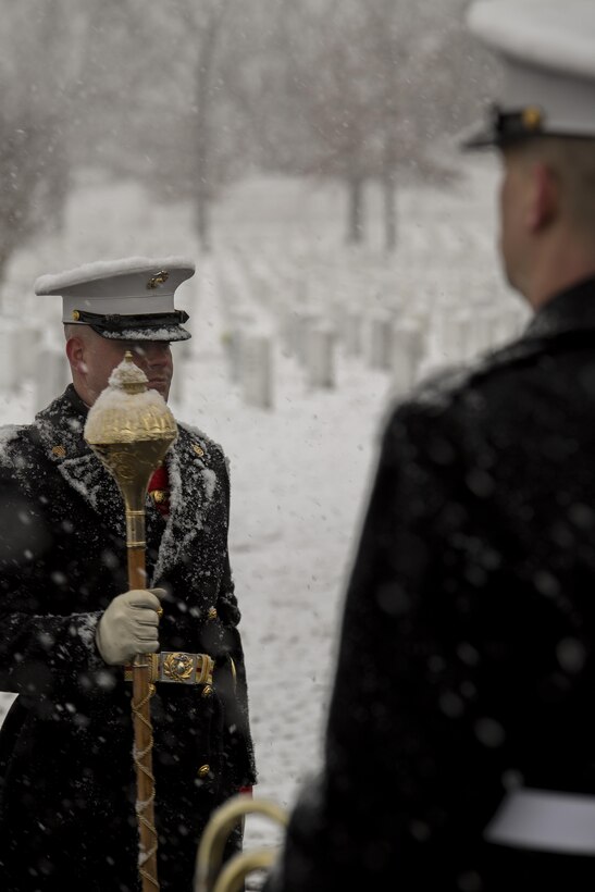 Staff Sgt. Steven Williams, U.S. Marine Band assistant drum major, stands in front of his Marines after the funeral of retired Marine Brig. Gen. Vincente T. Blaz at Arlington National Cemetery, Feb. 25, 2014. Blaz retired from the Corps in 1980 and went on to serve as Guam's non-voting delegate in the U.S. House of Representatives. (Official Marine Corps photo by Cpl. Dan Hosack/Released)