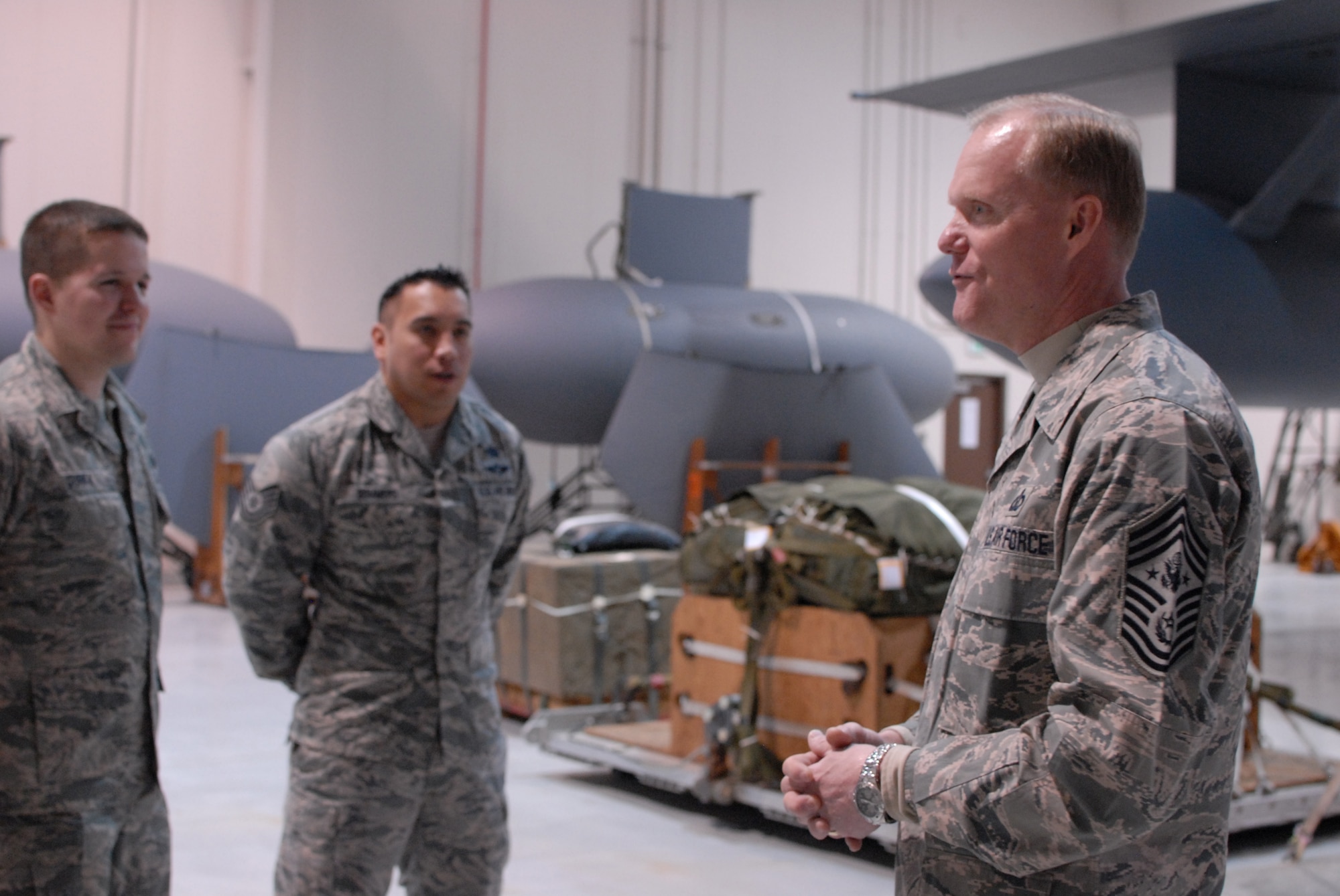 Chief Master Sgt. of the Air Force James A. Cody speaks with Airmen of the 193rd Special Operations Wing, Logistic Readiness Squadron Aerial Port. Chief Cody visited the 193rd Feb. 22-23 to get a firsthand look at the wing’s Commando Solo mission and speak with Airmen about challenges they face. (U.S. Air National Guard photo/Senior Airman Claire Behney)