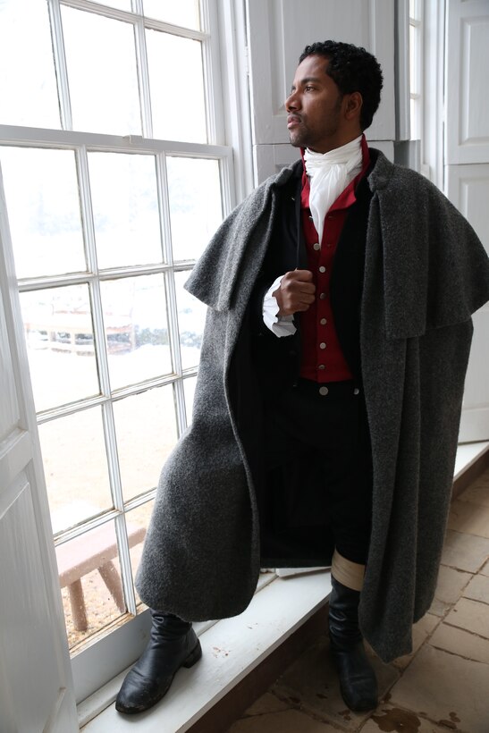 Jonathan Wood, an actor who plays the role of Christopher Sheels for George Washington’s Mount Vernon, poses for a photo outside of the greenhouse on Feb. 25, 2014. Wood has acted as Sheels for almost two years and answers questions that anyone may have about what it was like to be in his shoes.