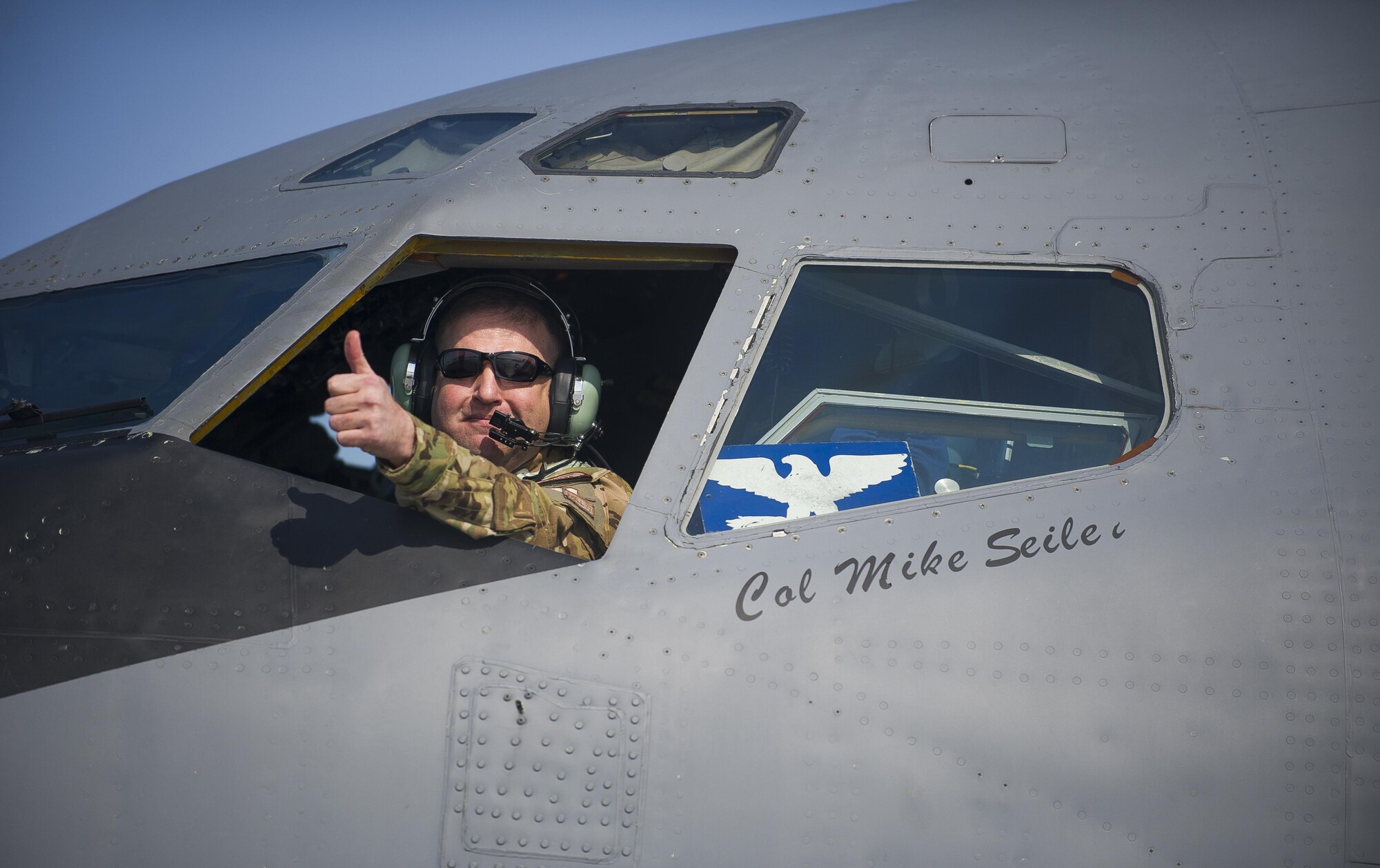 Col. Mike Seiler gives a thumbs up after completing the last refueling flight originating from Transit Center at Manas, Kyrgyzstan, Feb. 24, 2014. Seiler is the 376th Expeditionary Operations Group commander. (U.S. Air Force photo/Senior Airman George Goslin) 