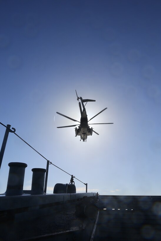 A CH-53 from VMM-163 reinforced supports the 11th Marine Expeditionary Unit's maritime raid force during visit, board, search and seizure training off the coast of Camp Pendleton, Calif. Feb. 26, 2014.  Both units are training for the 11th MEU's upcoming deployment later this summer. (Photo by: U.S. Marine Corps Capt. Joshua Diddams, Public Affairs, 11th Marine Expeditionary Unit)