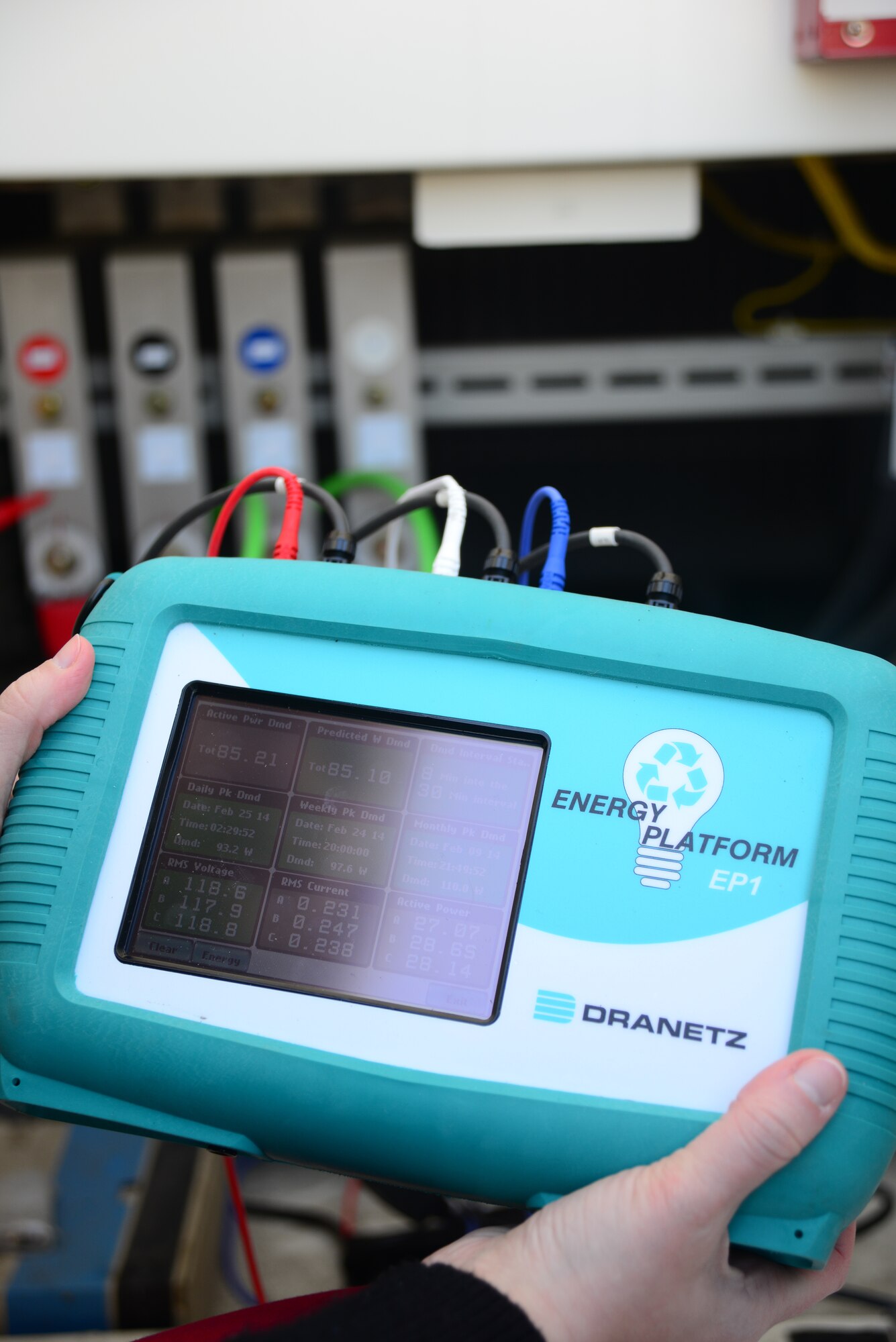 Cari Schroeder, 35th Civil Engineer Squadron resource efficiency manager, check an energy meter during a friendly energy reduction competition on Misawa Air Base, Japan, Feb. 26, 2014. This competition is to encourage behavioral changes in people and hopefully reduce this year’s energy bill by 10 to 15 percent per building involved. (U.S. Air Force photo by Tech. Sgt. April Quintanilla)