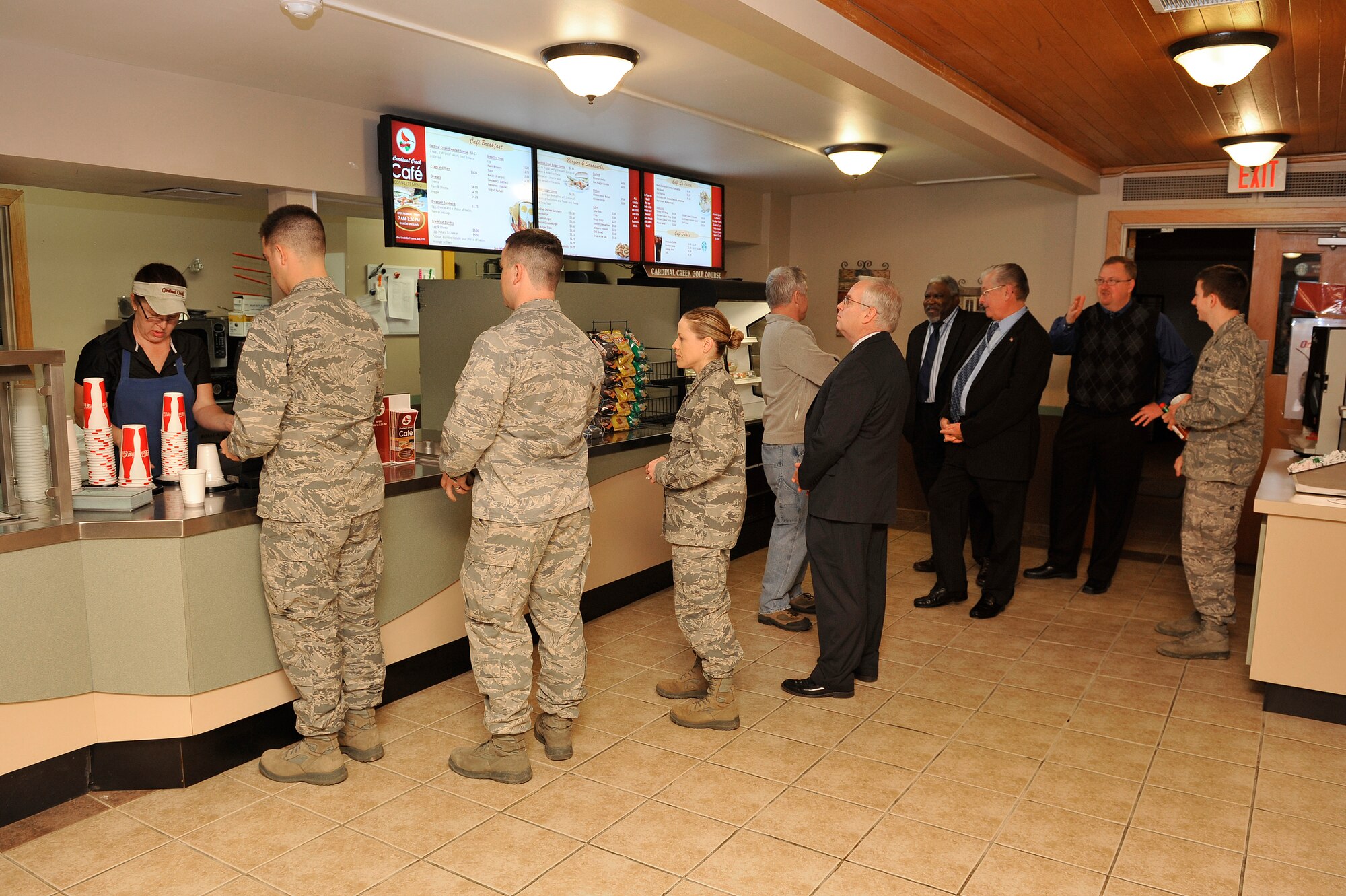 Patrons line up Feb. 20 at the Cardinal Creek Café -- the day it reopened after months of renovating following a flash flood last year. The cafe is open 7 a.m. to 1:30 p.m., Monday through Friday. (U.S. Air Force photo/Senior Airman Jake Eckhardt)