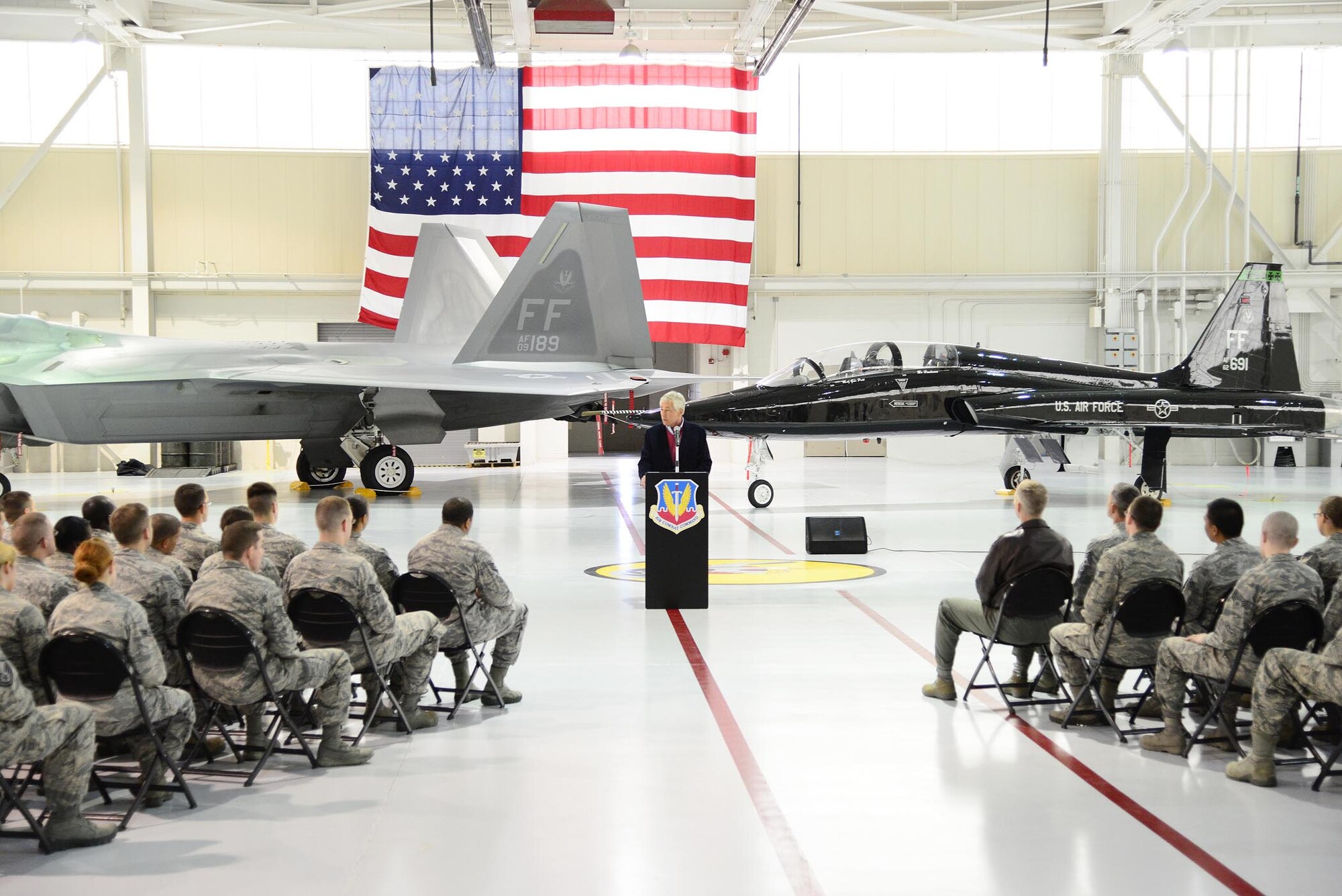 Defense Secretary Chuck Hagel speaks with Airmen chosen as top performers during a town hall meeting at Langley Air Force Base, Va., Feb. 25, 2014. Hagel spoke about proposed cuts in military spending, to include further reductions in troop strength and force structure in every military service in the coming year as part of an effort to prioritize U.S. strategic interests in the face of reduced resources after more than a decade of war. (U.S. Air Force photo by Staff Sgt. Antoinette Gibson/Released)