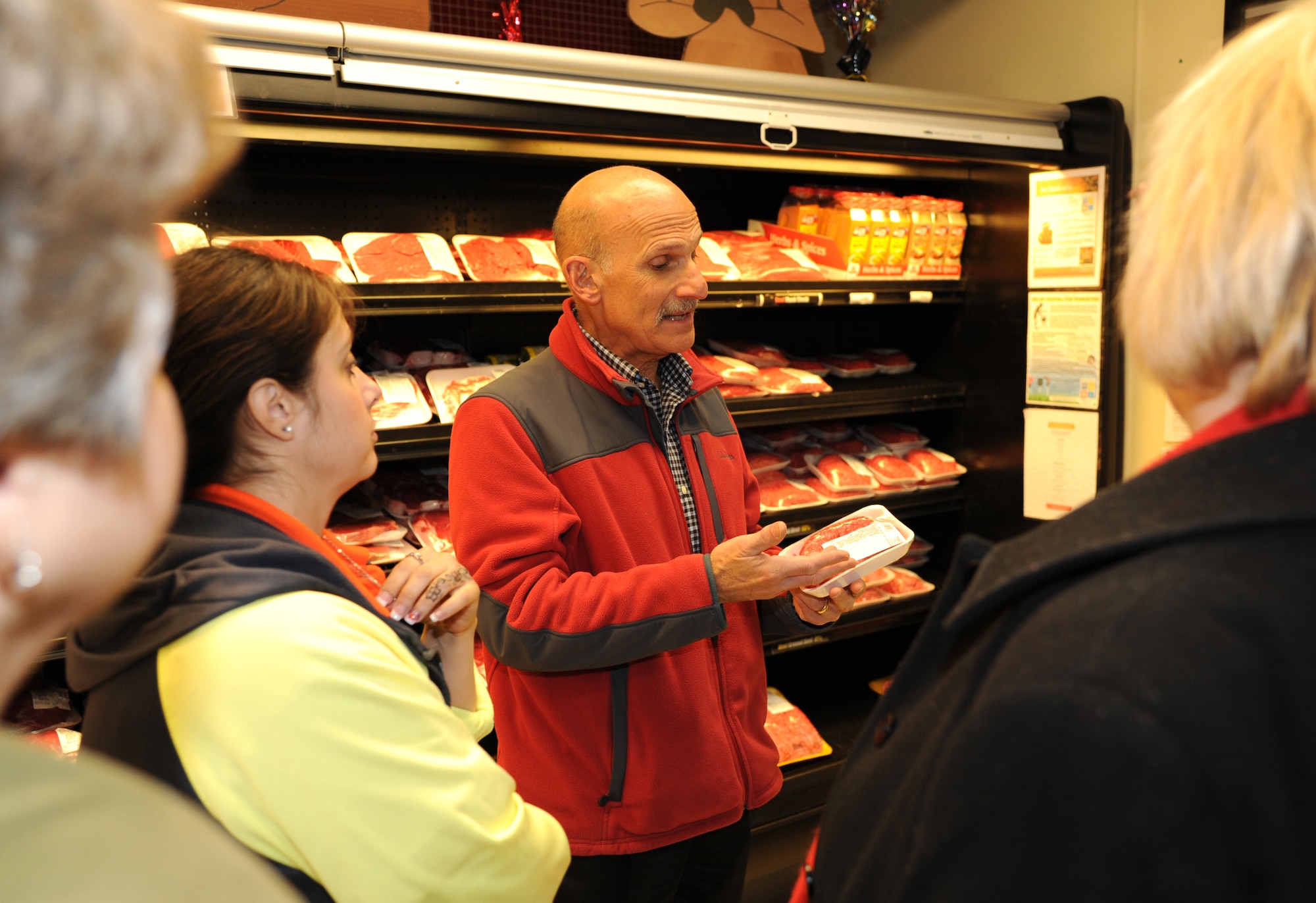 Joel Urdang, the health promotion program coordinator with the Health and Wellness Center, explains the art of reading nutrition labels to members of the “Planning, Shopping and Cooking for Health” class while in the Vance Commissary. The three-part class will be scheduled again in April. (U.S. Air Force photo/ Senior Airman Frank Casciotta)