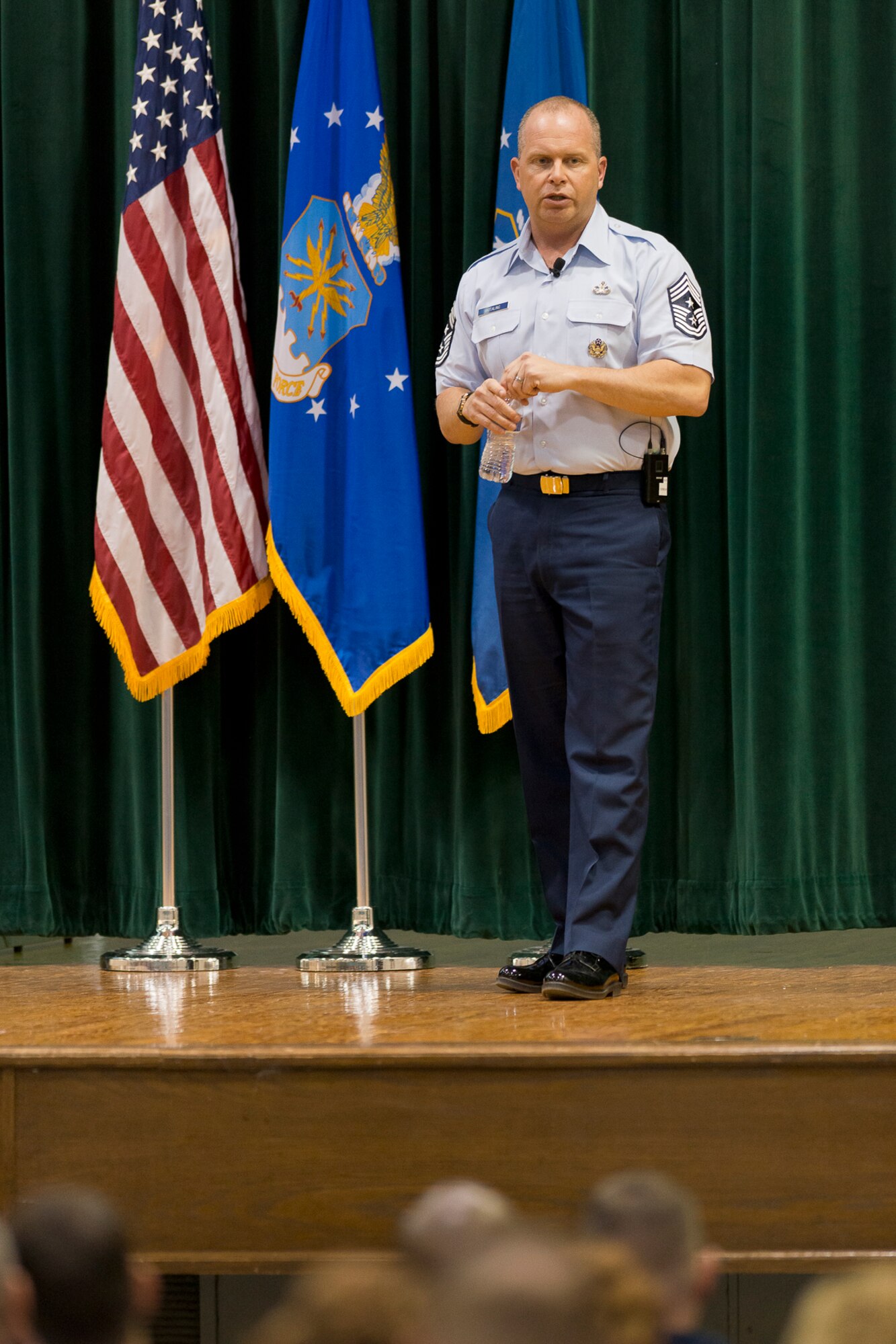 Chief Master Sgt. James W. Hotaling, the command chief of the Air National Guard, addresses airmen during an enlisted town-hall meeting at Joint Base Andrews, Md., Feb. 25, 2014. Hotaling also talked about the National Guard’s 377-year history of performing state and federal missions and three key areas where the ANG excels: protecting the homeland, fighting America’s wars and building global relationships through the State Partnership Program. Hotaling discussed the Command Chief Aim Point document, which addresses an renewed commitment to that profession of arms, health of the force and recognizing the accomplishments of Airmen. (U.S. Air National Guard photo by Master Sgt. Marvin R. Preston/Released)