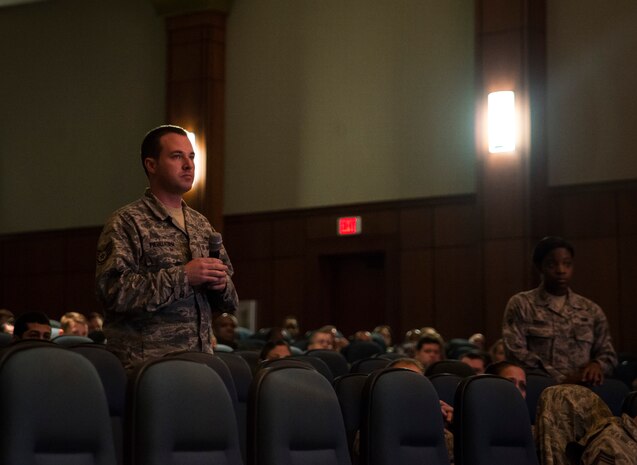 A Joint Base Charleston staff sergeant asks base leadership a question regarding the Force Management updates during an enlisted town hall meeting Feb. 26, 2014, at the JB Charleston-Air Base Theater. Town hall meetings regarding Force Management have been scheduled for Air Force enlisted, officers and spouses. (U.S. Air Force photo/ Senior Airman Dennis Sloan)