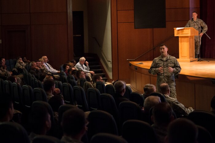 Chief Master Sgt. Mark Bronson, 628th Air Base Wing command chief, discusses Force Management updates with Joint Base Charleston enlisted members Feb. 26, 2014, at the JB Charleston-Air Base Theater. Town Hall meetings regarding Force Management have been scheduled for Air Force enlisted, officers and spouses. (U.S. Air Force photo/ Senior Airman Dennis Sloan)