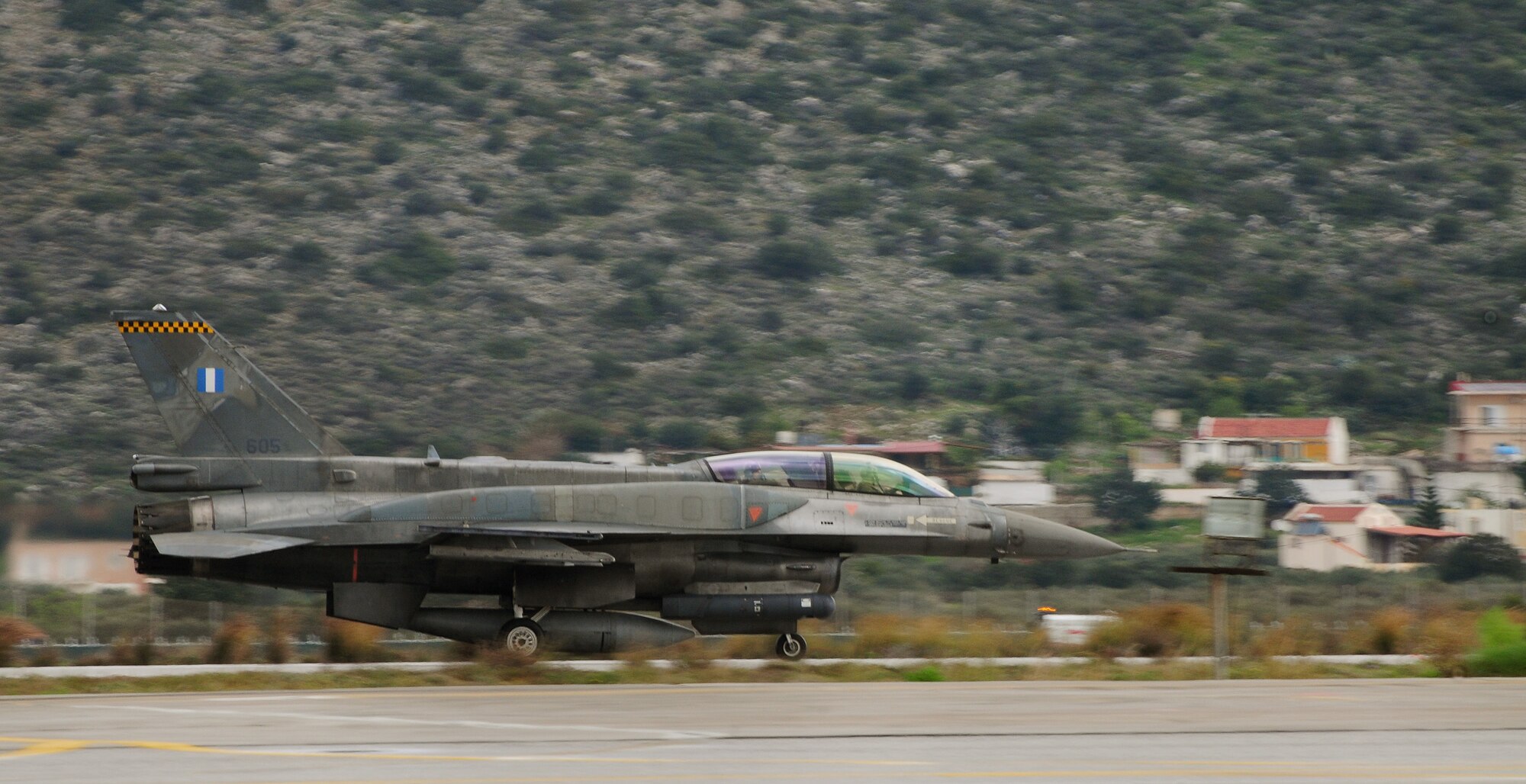 An Hellenic air force F-16 fighter jet taxis on the Souda Air Base, Greece, flightline while participating in joint war-fighting training with the U.S. Air Force, Feb. 25, 2014. More than 250 Airmen deployed to Crete to work with NATO partners and build upon a strong military relationship. (U.S. Air Force photo by Staff Sgt. Thomas Trower/Released)