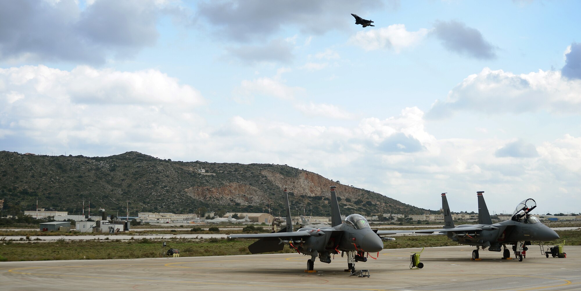 An F-15E Strike Eagle from the 494th Expeditionary Fighter Squadron takes off from Souda Air Base, Greece, during a flying training deployment with the Hellenic air force, Feb. 25, 2014. The mission exercised participating units in combined air operations and extended joint war-fighting capability through operational training. (U.S. Air Force photo by Staff Sgt. Thomas Trower/Released)