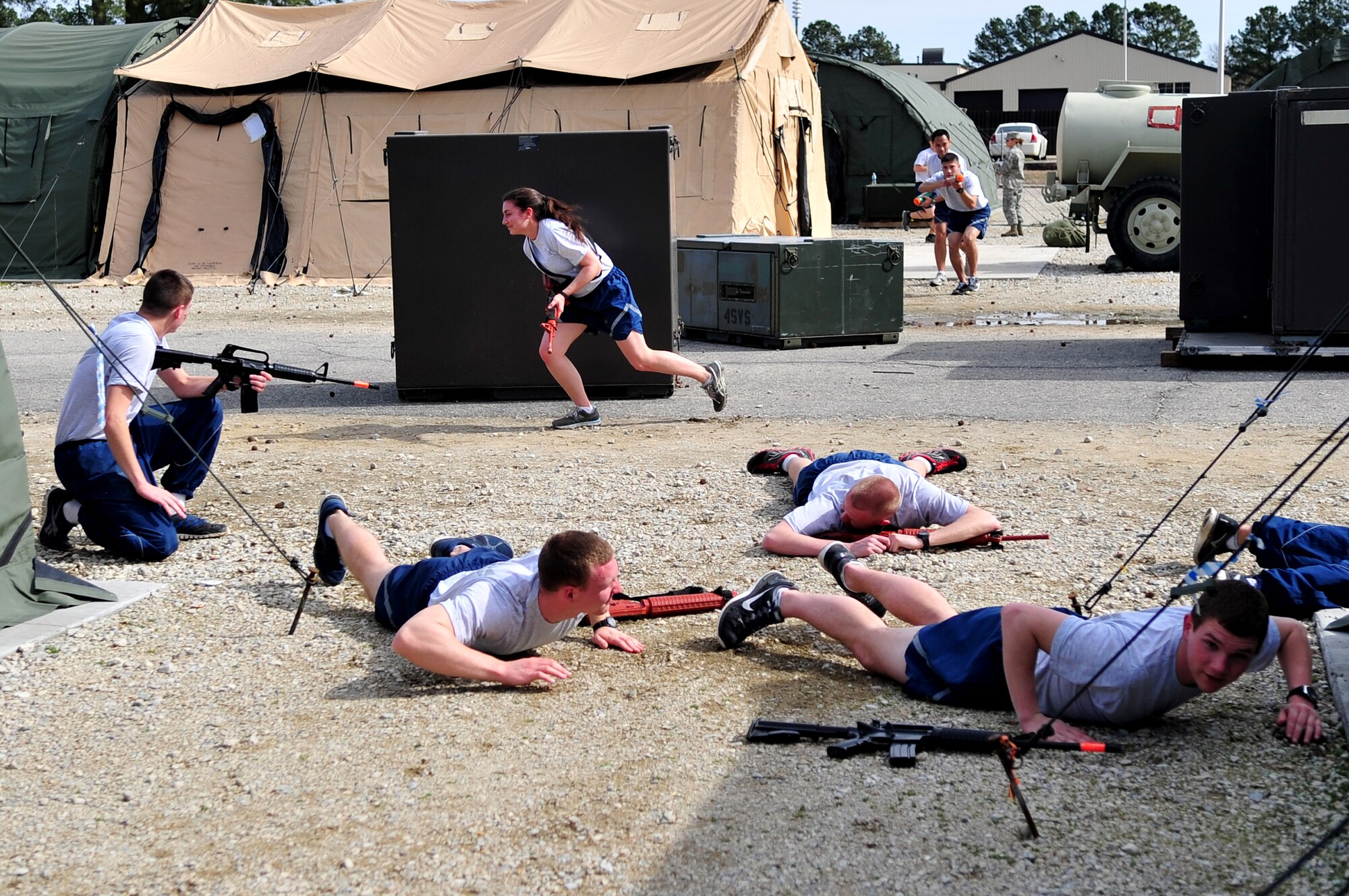Air Force Reserve Officer Training Corps cadets from various North Carolina universities run through several Field Training Preparatory Exercise scenarios, Feb. 22, 2014, at Seymour Johnson Air Force Base, N.C. Field Training is required for all cadets who seek membership in the Professional Officer Course and occurs the summer after their sophomore year. This program involves physical conditioning, weapons training and survival training. (U.S. Air Force photo by Airman 1st Class Shawna Keyes)