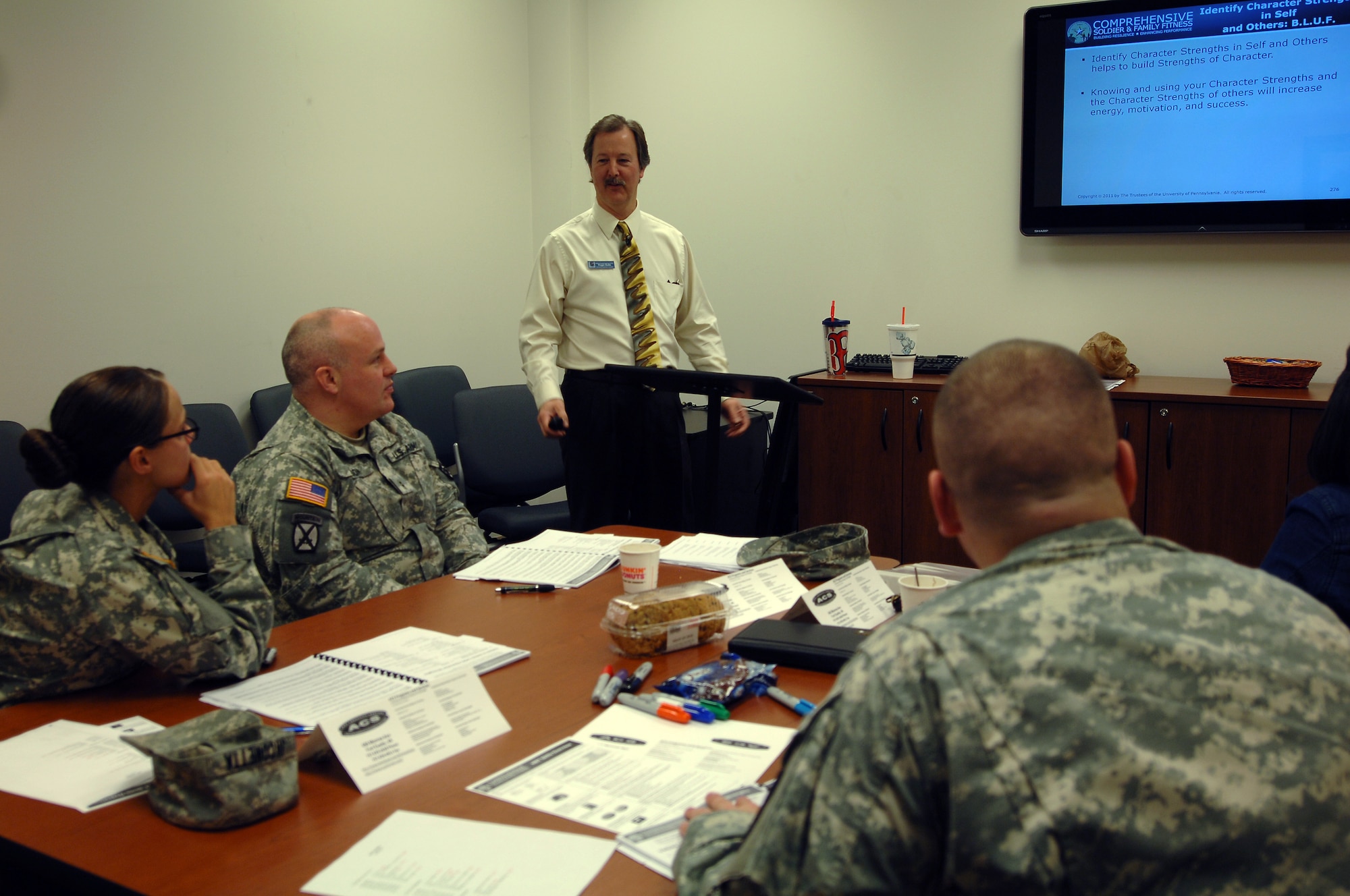 Roger Bullis, 733rd Force Support Division community relations consultant, leads a Master Resiliency training course at Fort Eustis, Va., Feb. 20, 2014. The Army Community Service is available for all active duty Service members and their families, Department of Defense civilians, contractors and retirees. Bullis hails from Williamsburg, Va. (U.S. Air Force photo by Airman 1st Class Areca T. Wilson/Released)