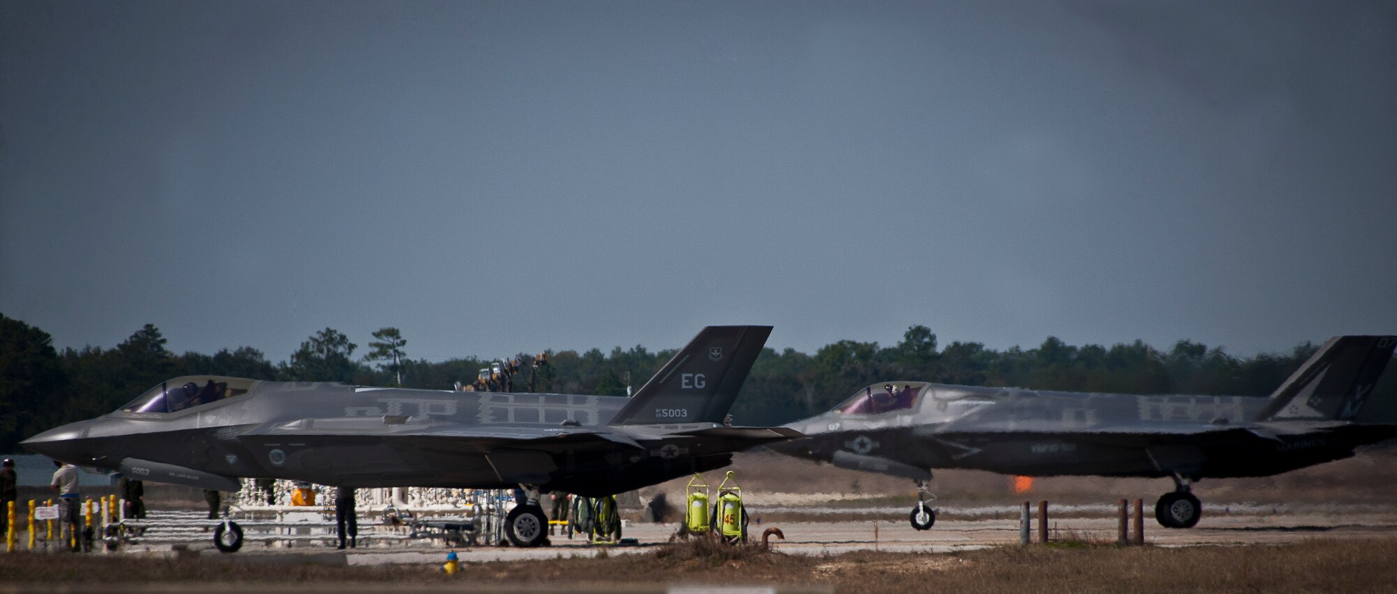 Royal Air Force pilot, Squadron Leader Hugh Nichols, moves his Marine F-35B Lightning II in for refueling after the first short take-off and vertical landing sortie by a United Kingdom pilot at Eglin Air Force Base, Fla., Feb. 25.  The U.S. Marines began flying STOVL sorties at Eglin in October 2013.   (U.S. Air Force photo/Samuel King Jr.)