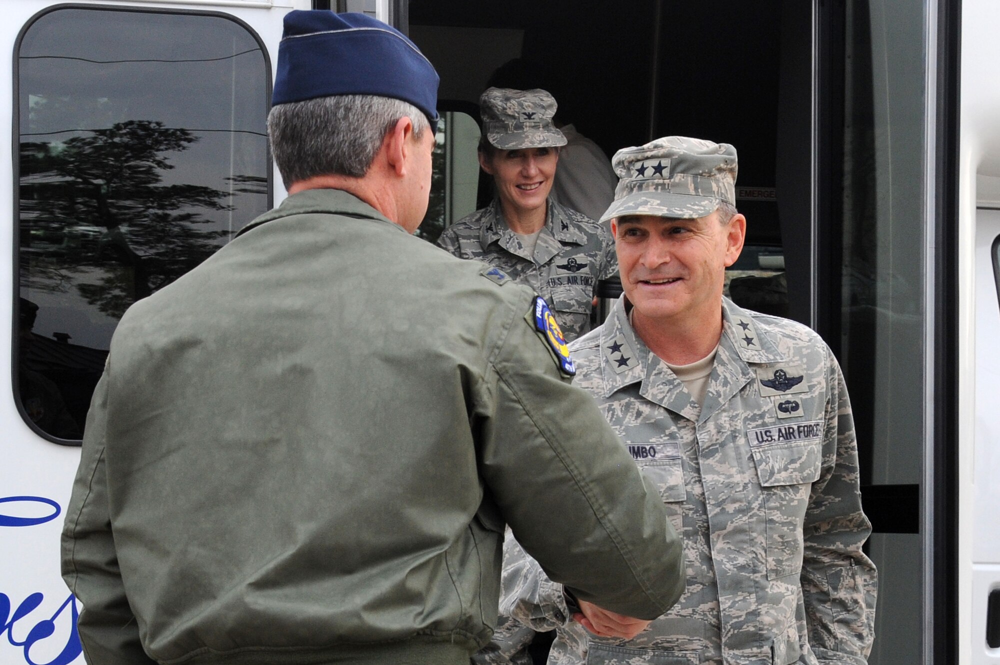 Col. Kevin Fesler, 414th Fighter Group commander, (left) greets Maj. Gen. Jake Polumbo, Ninth Air Force commander, during an orientation tour of the installation, Feb. 20, 2014, at Seymour Johnson Air Force Base, N.C. The 4th Fighter Wing falls under the 9th AF, which leads more than 29,000 active duty and civilian personnel with more than 400 aircraft to complete the mission. (U.S. Air Force photo by Airman 1st Class Aaron J. Jenne)