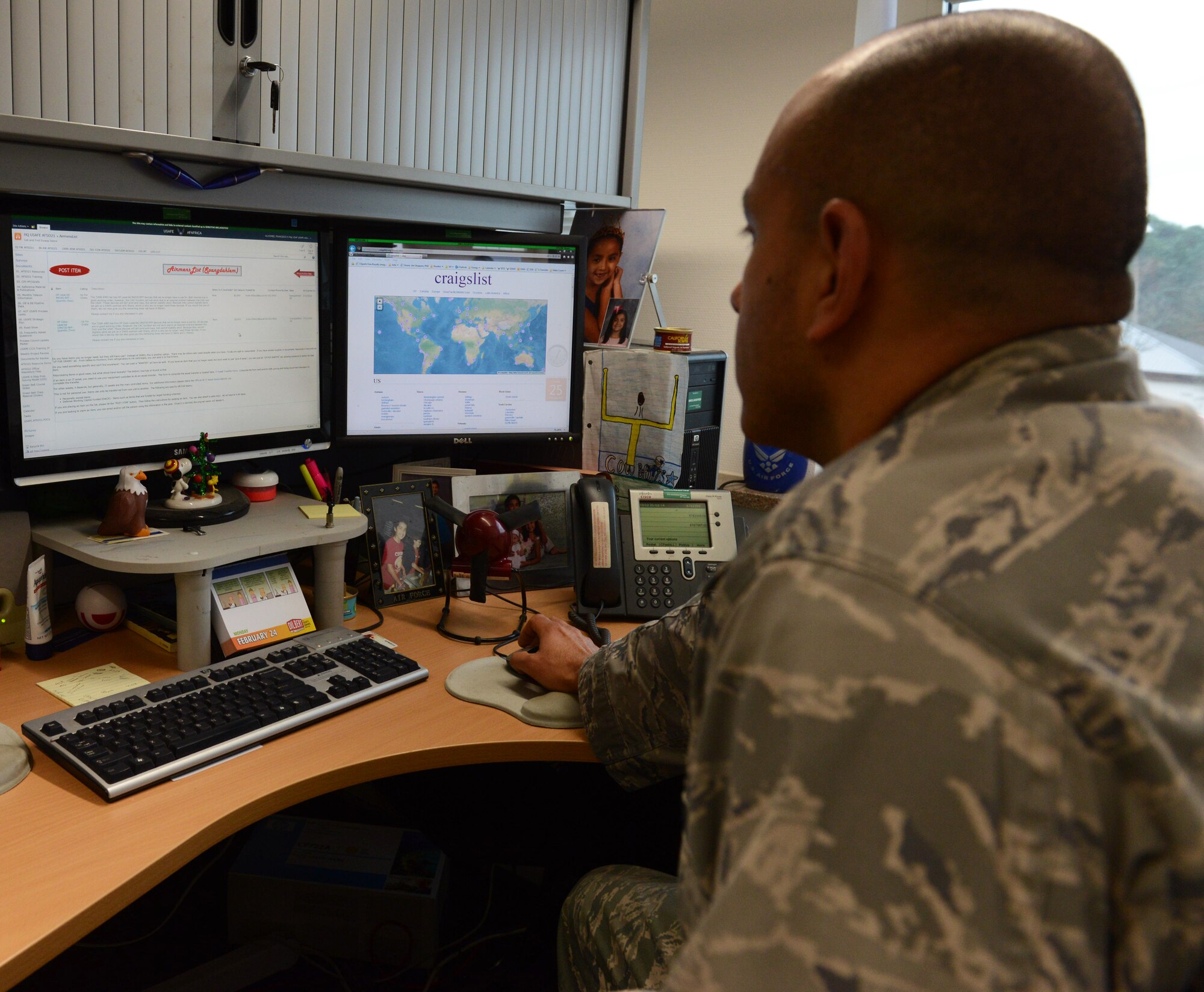 RAMSTEIN AIR BASE, Germany -- Maj. Rene Alvidrez, U.S. Air Forces in Europe-Air Forces Africa Business Transformation Office Information Management and Technology Branch chief, takes a look at Airmen's List Feb. 25, 2014 while working in his office here. Alvidrez designed the site to help USAFE-AFAFRICA units save resources and money. The site has saved the command $150,000 since June 2013.  (U.S. Air Force Photo By Tech. Sgt. James M. Hodgman)  
