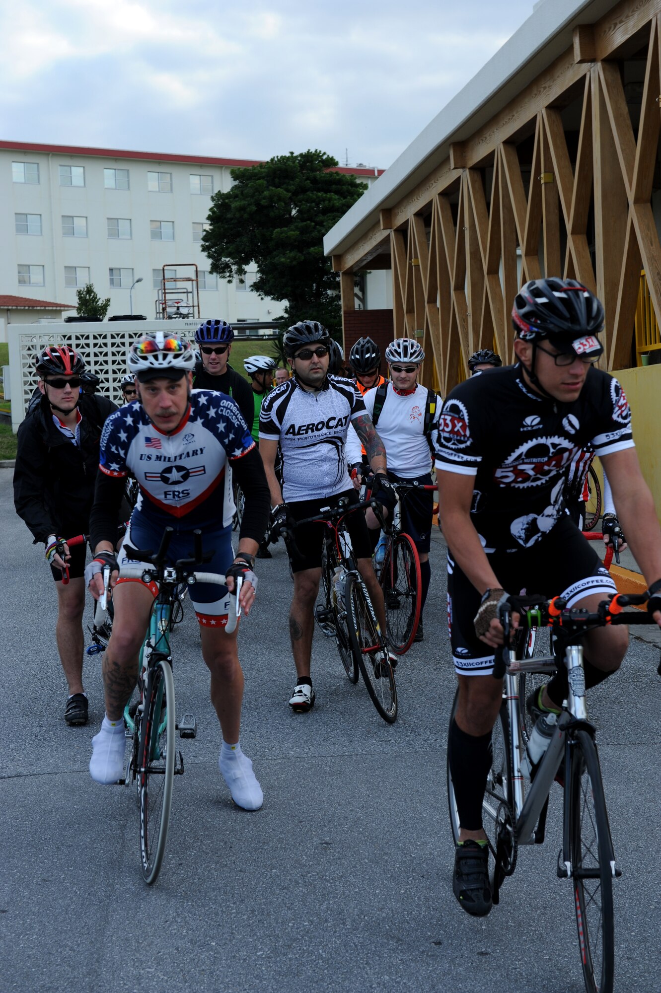 Riders participating in the 24-hour honor ride begin the event on Marine Corps Camp Foster, Japan, Feb. 22, 2014. The 24-hour bike ride is hosted annually and allows those who participate to set personal goals and honor family members and fallen comrades. Riders accomplished more than 200 miles in the given timeframe. (U.S. Air Force photo by Airman 1st Class Hailey R. Staker)