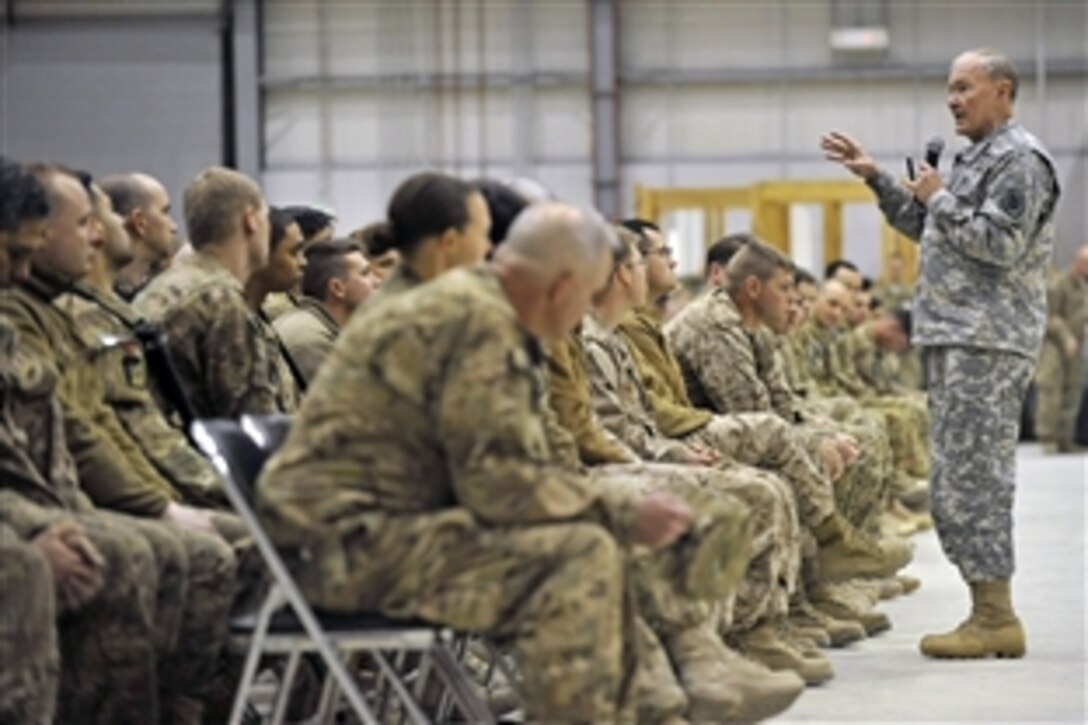 U.S. Army Gen. Martin E. Dempsey, chairman of the Joint Chiefs of Staff, talks to service members at a town hall meeting on Bagram Airfield, Afghanistan, Feb. 26, 2014. Dempsey answered questions ranging from the future of U.S. military operations in Afghanistan to force reductions.