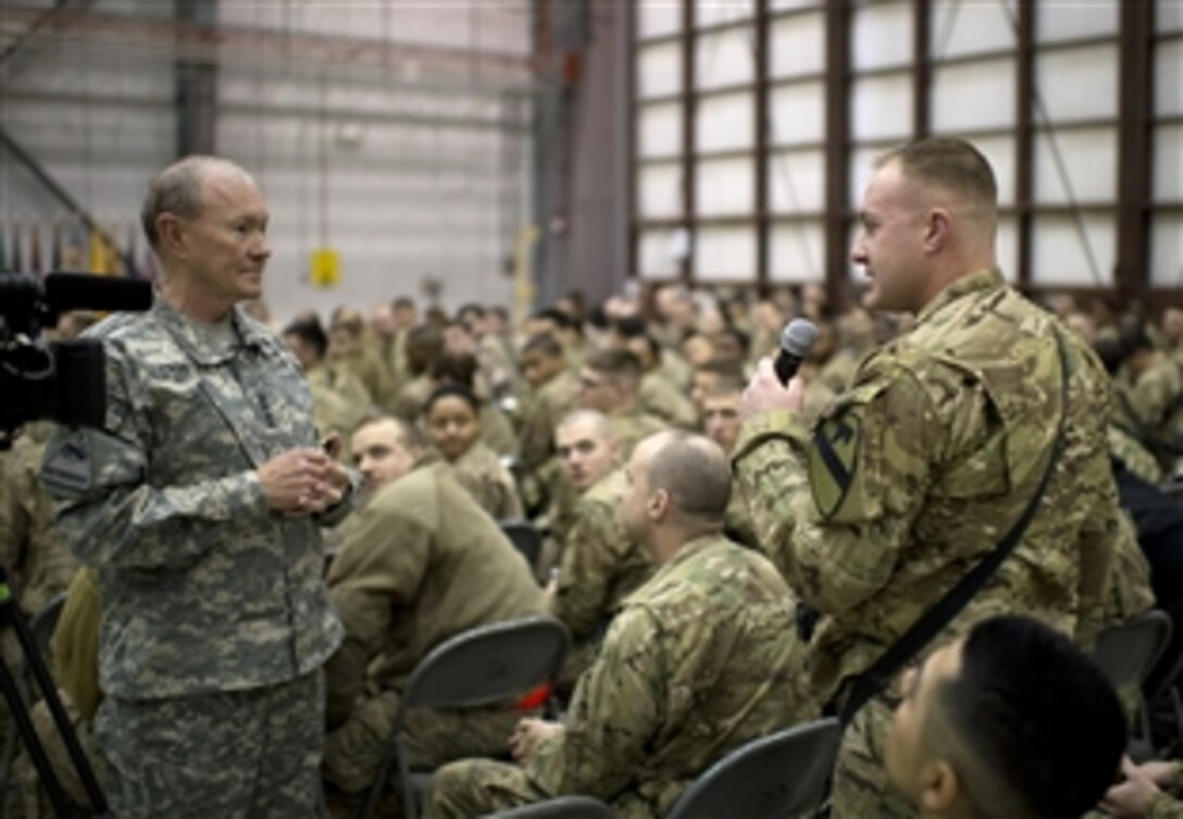 U.S. Army Gen. Martin E. Dempsey, chairman of the Joint Chiefs of Staff, addresses questions from service members on Bagram Airfield, Afghanistan, Feb. 26, 2014. Dempsey traveled to Afghanistan to talk with troops and commanders to assess the mission's status.  
