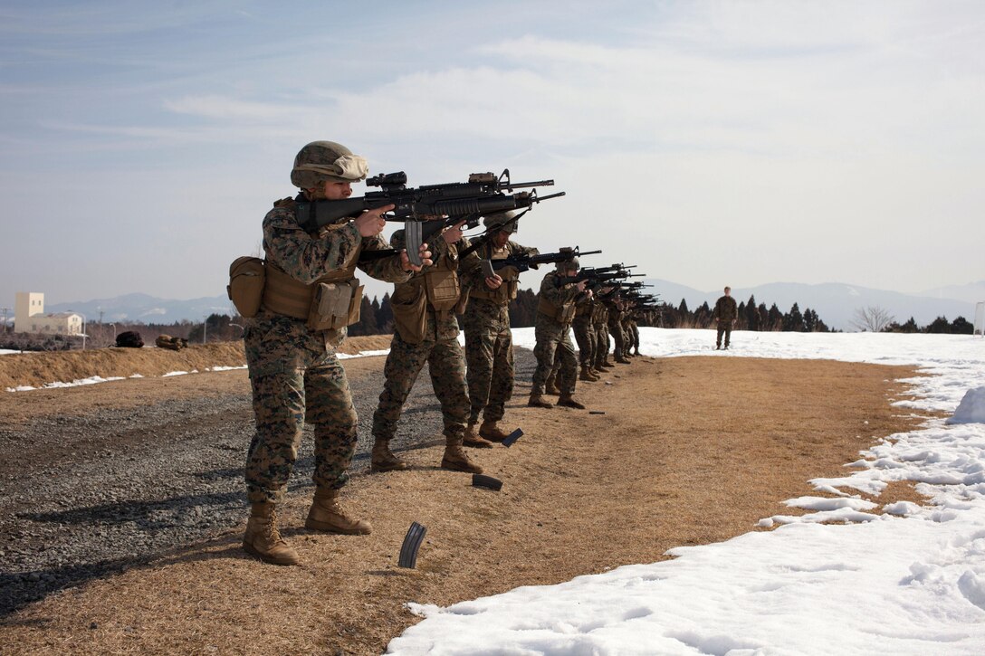 Marines with the quick reaction force of Battery L, 3rd Battalion, 12th Marine Regiment, practice speed reload drills Feb. 19 during the East Fuji Battery-level Exercise at Combined Arms Training Center, Camp Fuji. “An artillery battery can’t really turn its guns to protect its flank, so that’s where the QRF comes in,” said Sgt. Carlos Moreno, an artilleryman with Battery L, 3rd Battalion, 12th Marine Regiment, 3rd Marine Division, III Marine Expeditionary Force. 