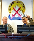 Army Maj. Gen. Stephen J. Townsend, commander of CJTF-10 and 10th Mountain Division, briefs Gen Martin E. Dempsey, chairman of the Joint Chiefs of Staff, about local operations in Regional East Headquarters on Bagram Air Base, Afghanistan, Feb. 26, 2014. Dempsey is in Afghanistan to visit troops and commanders.
