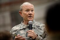Gen. Martin E. Dempsey, chairman of the Joint Chiefs of Staff, addresses questions from service members deployed at Bagram Air Base, Afghanistan, Feb. 26, 2014. Dempsey is in Afghanistan to visit troops and commanders to assess mission status.
