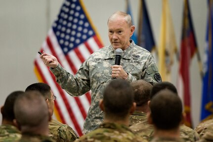 Gen. Martin E. Dempsey, chairman of the Joint Chiefs of Staff, addresses questions from service members deployed at Bagram Air Base, Afghanistan, Feb. 26, 2014. Dempsey is in Afghanistan to visit troops and commanders to assess mission status.