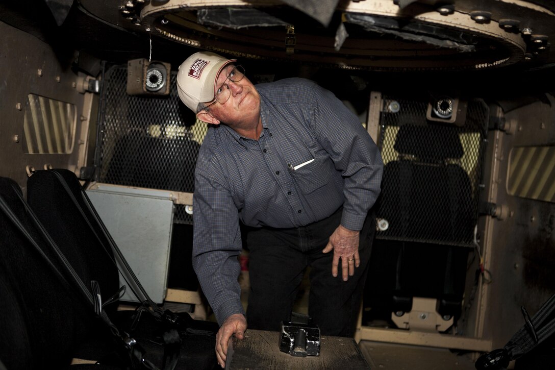 Bobby Thornton, a state board member of the Farm Bereau Association, participates in a urban terrain combat simulation at the Simulation Integration Center aboard Marine Corps Base Camp Lejeune, Feb. 24. The puprose of the visit was to gain a better understanding of Marine Corps in hopes of forming a charitable partnership.  