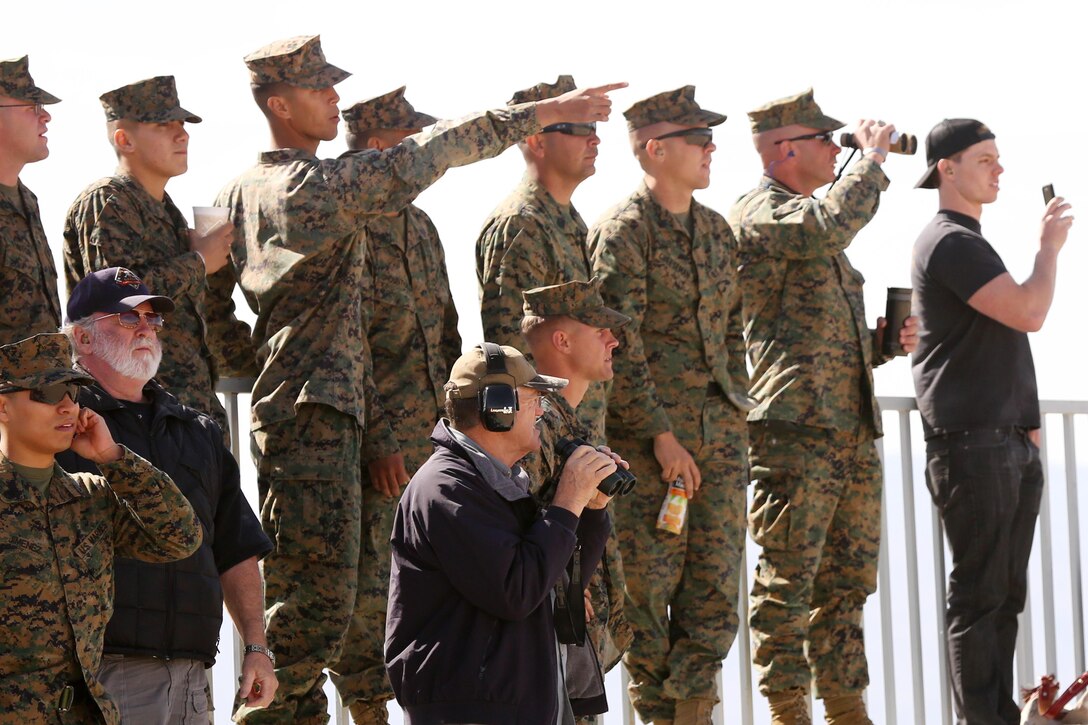 Spectators watch as Marines with 1st Tank Battalion, 2nd Tank Battalion and 4th Tank Battalion compete in the 11th Annual Tank Gunnery Competition at Range 500, Feb. 20, 2014. The annual event has pitted the best of each battalion against each other in fierce competition since it began in 1996.


