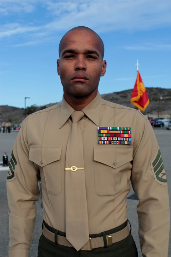 Staff Sgt. Mindo D. Estrella, platoon commander, 2nd Battalion, 4th Marine Regiment, was recognized for outstanding leadership and awarded the Navy and Marine Corps Achievement Medal during a ceremony at Marine Corps Base Camp Pendleton, Calif., Feb. 21, 2014. Estrella, a 31-year-old native of East Chicago, Ind., and a 2002 graduate of Central High School in Erie, Penn., received the prestigious Sergeant Major Joseph J. Ellis Leadership Award for his dedication during an eight-month deployment to Okinawa, Japan, as part of the 31st Marine Expeditionary Unit. During his time in Japan, Estrella trained his Marines rigorously in martial arts and leadership. He received greater responsibilities than usual for his rank, and his current position is typically filled by a commissioned officer. During his career, Estrella deployed three times to Iraq, twice to Okinawa and once to Afghanistan. He is a recipient of the Purple Heart, Navy Commendation Medal, three Navy and Marine Corps Achievement Medals with combat V for valor, and three Good Conduct Medals.
(U.S. Marine Corps photo by Sgt. Jacob H. Harrer / cleared for release)
