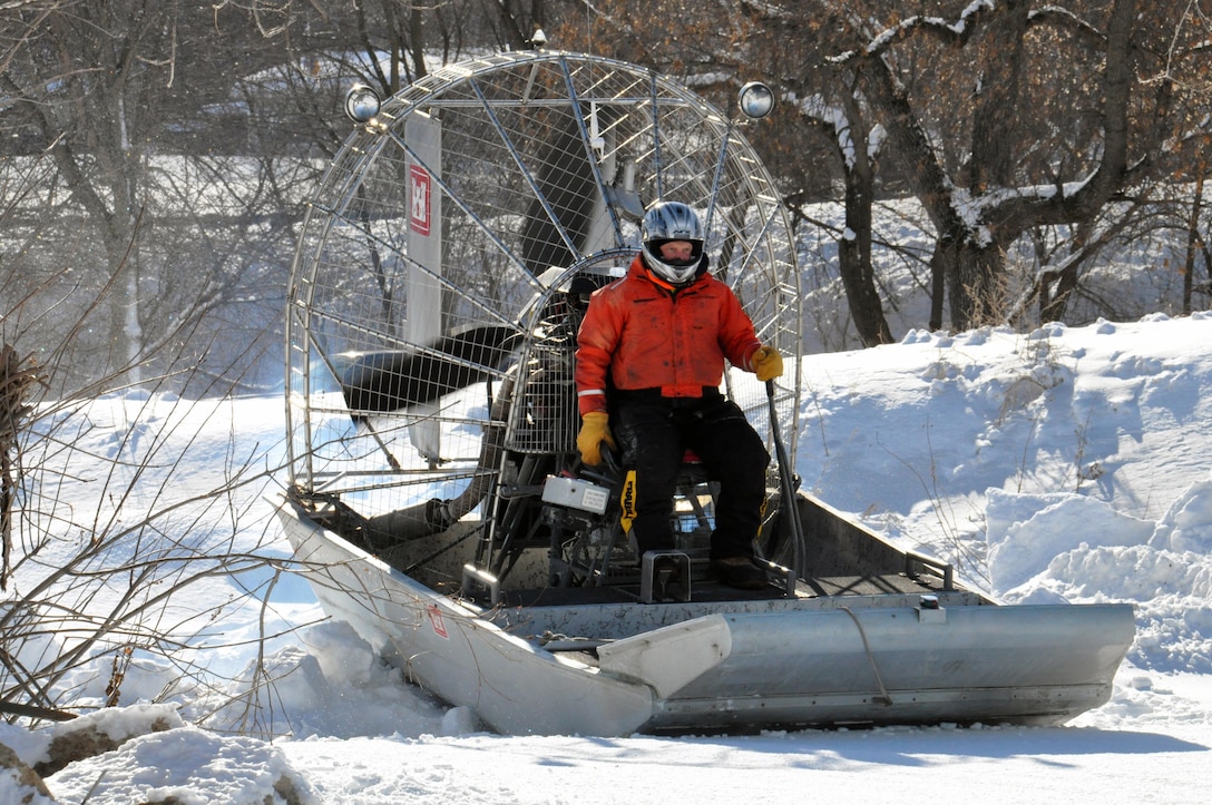 RED WING, Minn. – Al VanGuilder, St. Paul District lead survey technician, launches the St. Paul District airboat on to the Mississippi River, near Lake City, Minn., Feb. 27, to begin measuring the ice thickness within Lake Pepin. The Corps of Engineers measures the ice thickness every spring and the navigation industry uses the information to determine when to break through the ice and begin the shipping season. Lake Pepin ice is traditionally the last hurdle for the navigation industry to deal with before reaching St. Paul, because the ice is usually a lot thicker in the lake due to the slow moving current.                                                                                   