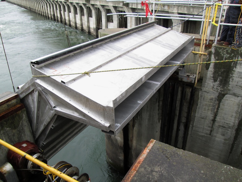 The entrance hood of McNary Lock and Dam’s prototype lamprey-passage structure fits perfectly into place at the front of the Oregon shore fish ladder. 