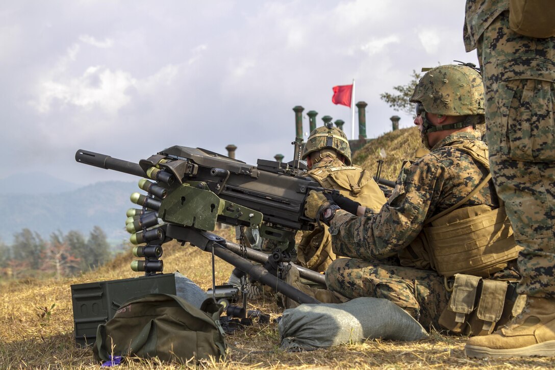 Lance Cpl. Jake A. Kelley fires the Mark 19 Grenade Launcher during a weapons demonstration Feb. 12 at Ban Chan Krem, Kingdom of Thailand during Exercise Cobra Gold. Thailand and the United States are committed to working together in areas of common interest for the betterment of regional security. The long-standing alliance and partnership continues to grow and strengthen. Kelley is a machine-gunner with Weapons Company, 3rd Battalion, 1st Marine Regiment currently assigned to 4th Marine Regiment, 3rd Marine Division, III Marine Expeditionary Force under the unit deployment program.