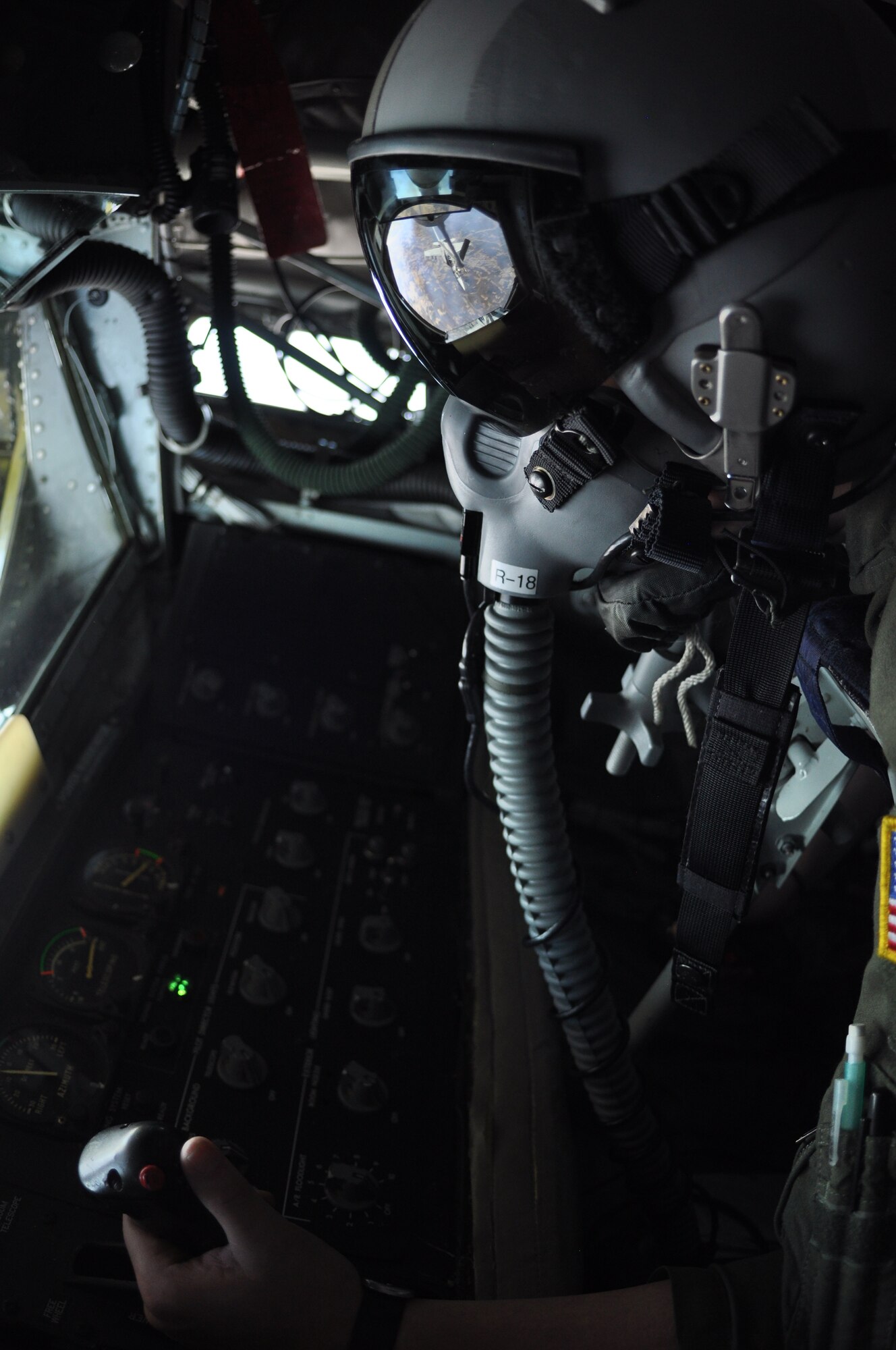 Senior Airman Sierra M. Dopfel, a boom operator from the 18th Air Refueling Squadron, 931st Air Refueling Group located at McConnell AFB, Kan., holds the boom steady as a Navy FA-18 Super Hornet from Naval Air Station Lemoore, Calif., receives fuel via drogue, Feb. 27. The 18th ARS, were providing aerial refueling training to Naval aviators and gaining experience refueling with the drogue attachment, which is typically used when refueling Navy, Marine Corps and coalition forces aircraft. (Air Force photo by Master Sgt. Brannen Parrish)