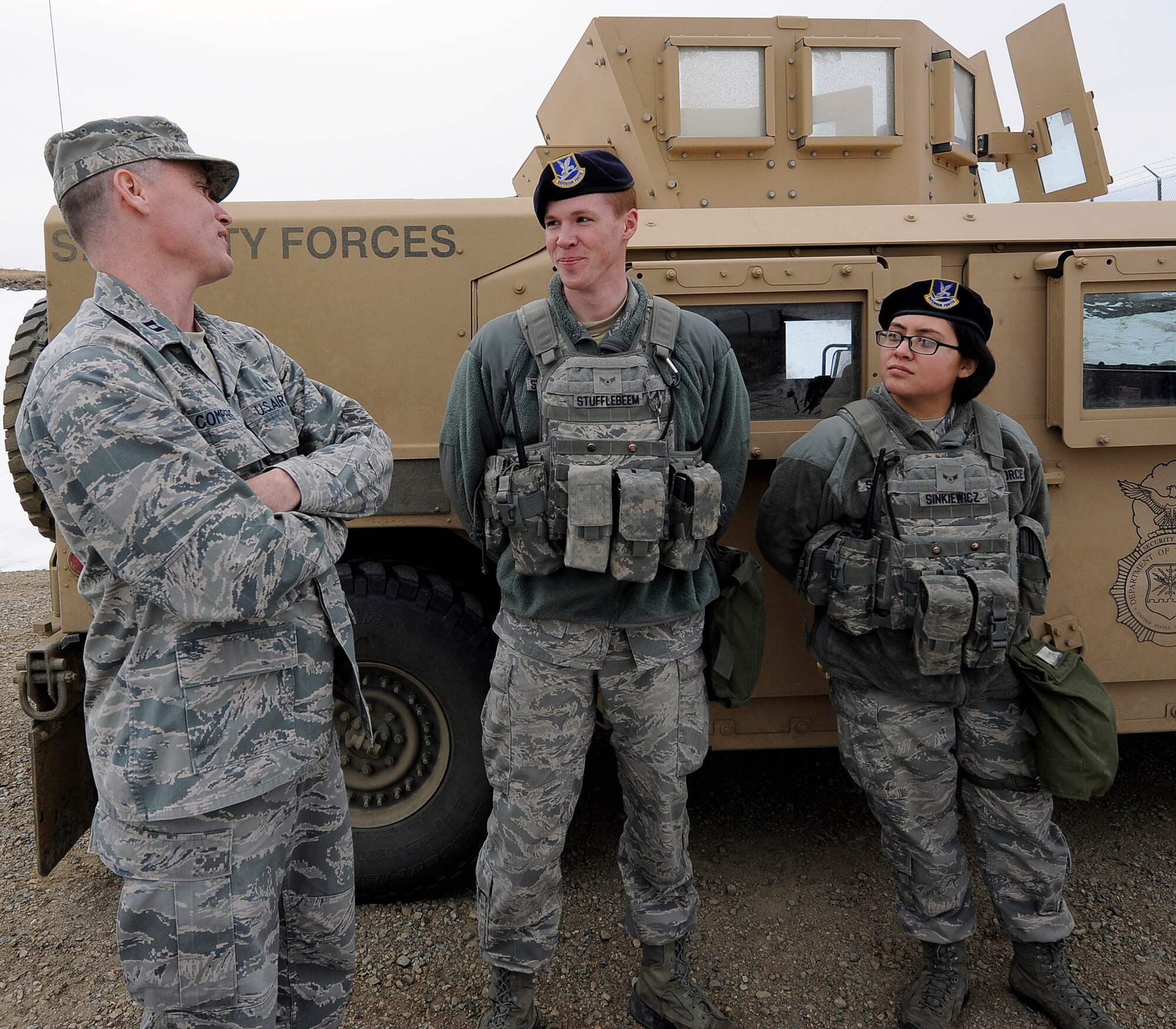 Chaplain (Capt.) Robert Compere, 341st Missile Wing chaplain (left), speaks with Airmen in the missile field Feb. 20. Malmstrom’s Chaplain Corps cover the entire 13,800-square-mile missile complex, including the base. With more than 3,300 military members, 550 civilians and 3,200 dependents assigned to Malmstrom, the ratio of people to chaplains is almost 1,000 to one. (U.S. Air Force photo/Airman 1st Class Collin Schmidt)