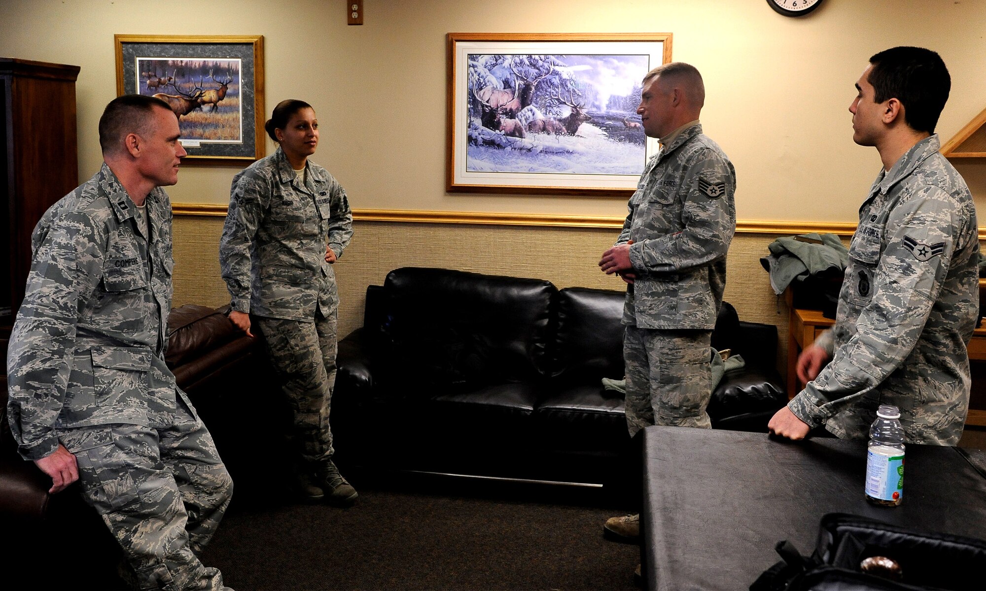 Airmen speak with a Chaplain and Chaplain assistant during a MAF a Month tour Feb. 20. During the tours, chaplain teams visit all of Malmstrom’s 15 missile alert facilities to speak with Airmen and make sure their mental health and morale is good while locally deployed in the missile field.  (U.S. Air Force photo/Airman 1st Class Collin Schmidt)